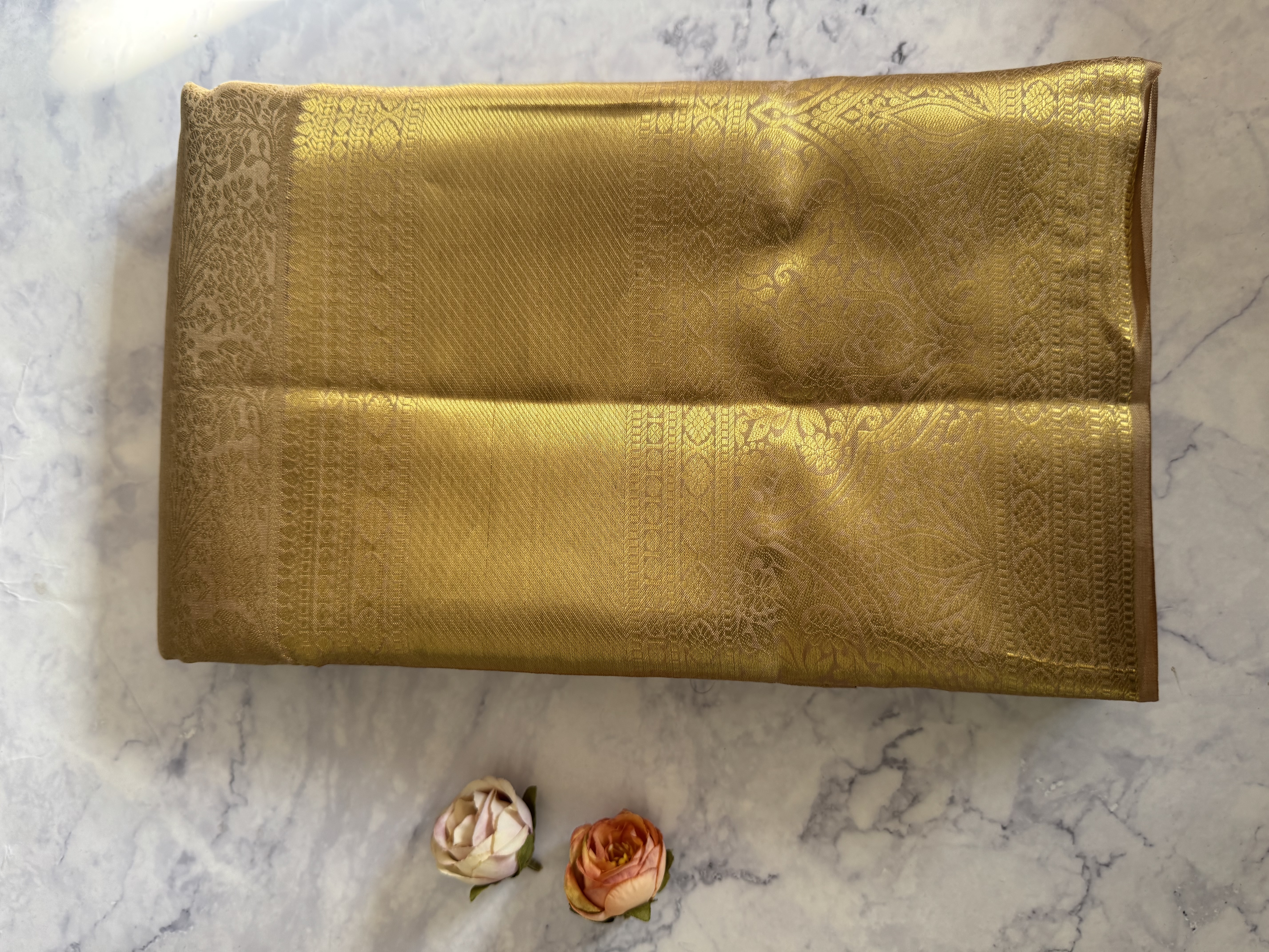 Beige pure silk saree with heavy gold work