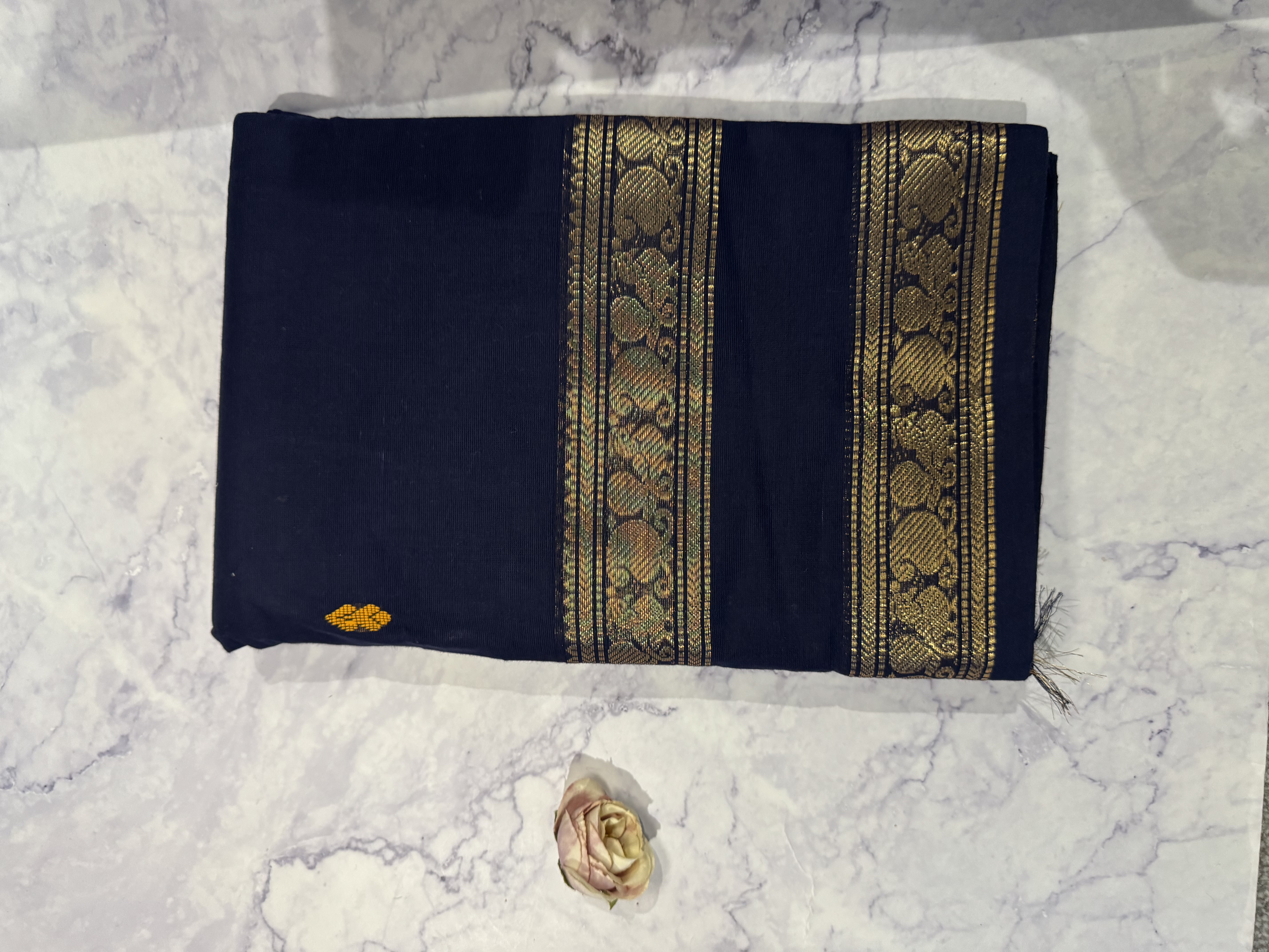 Navy blue cotton saree with gap border