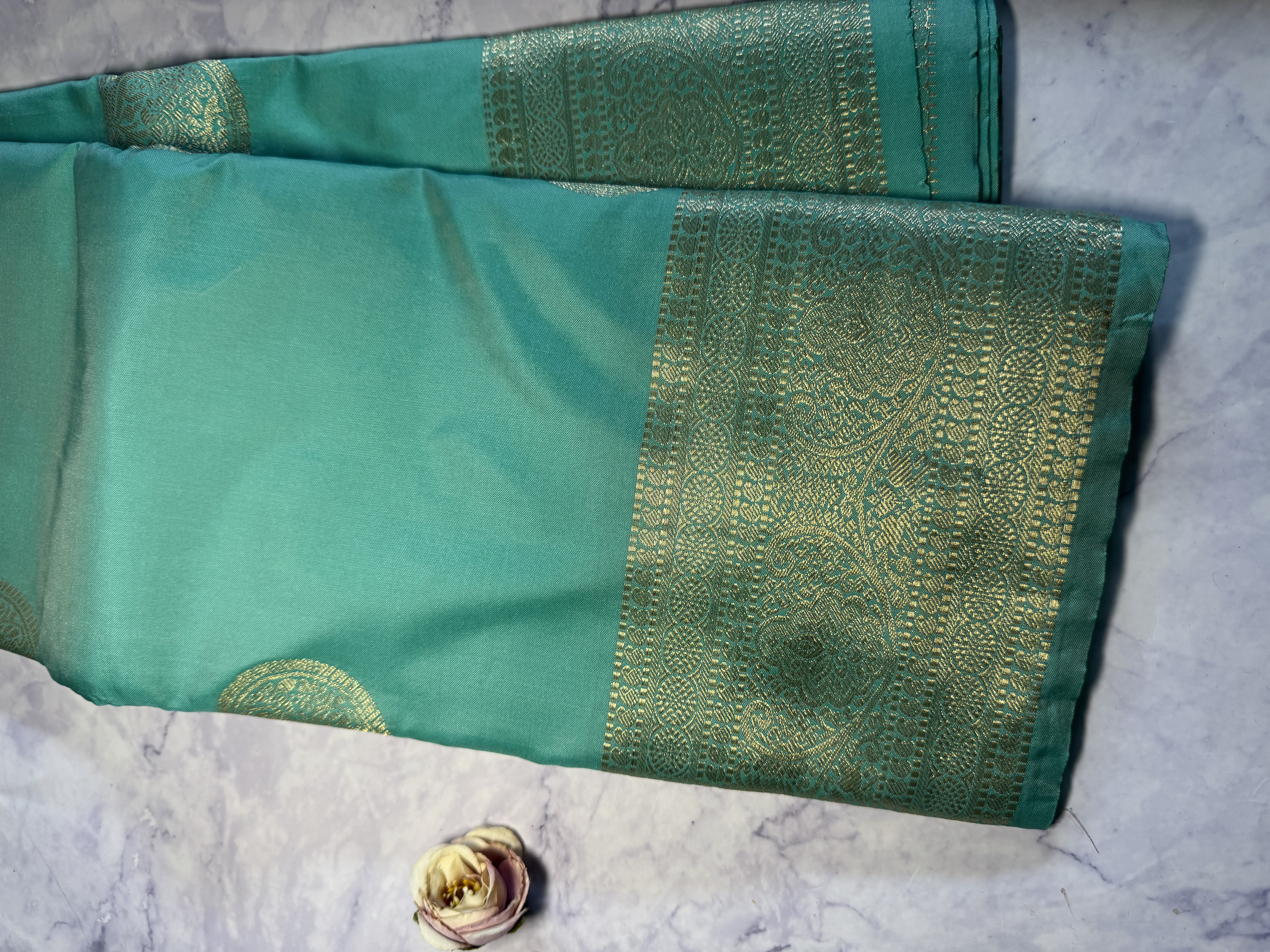 Aqua blue semi silk saree with round buttas 