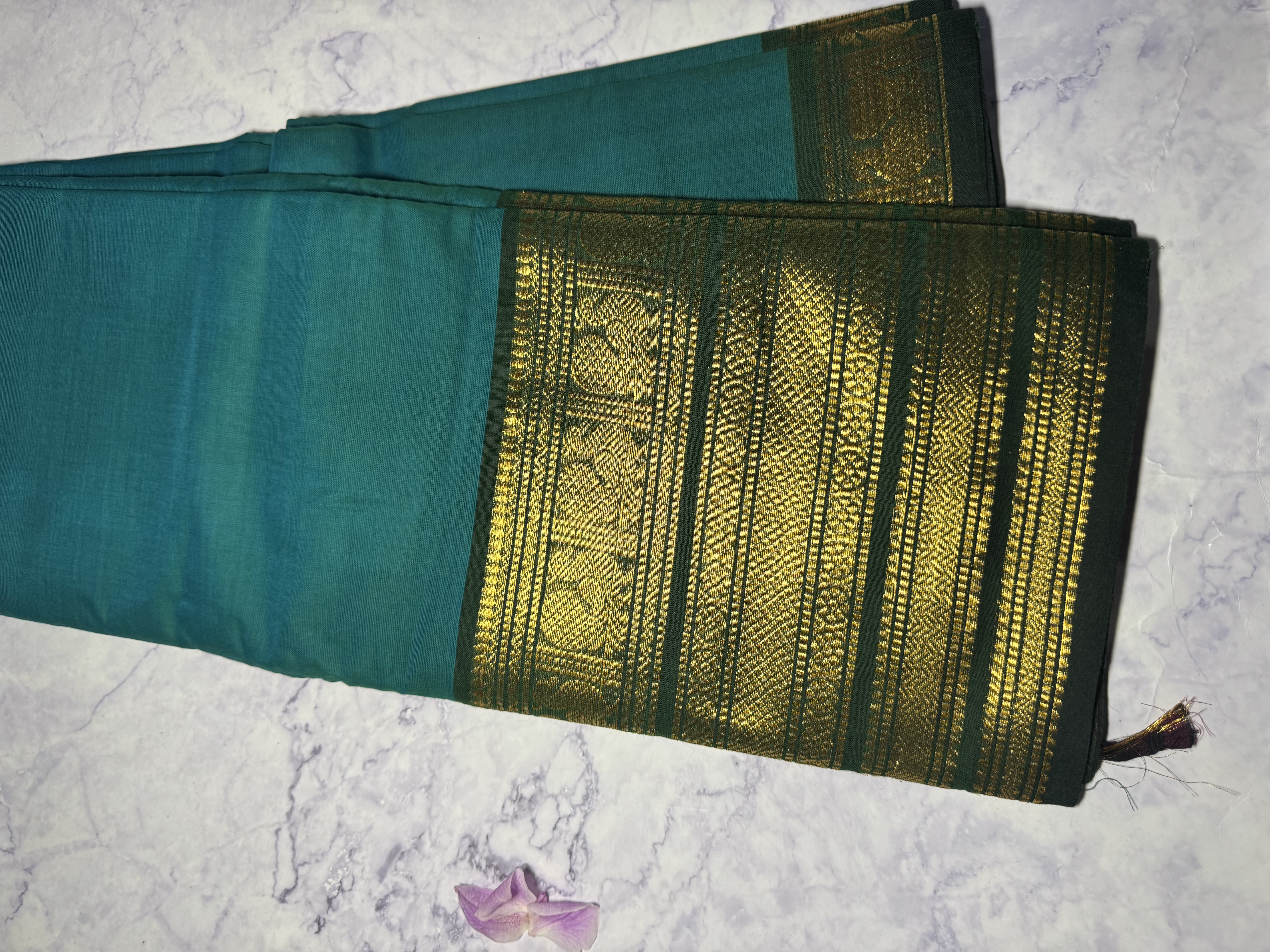 Teal green cotton saree with forest green border