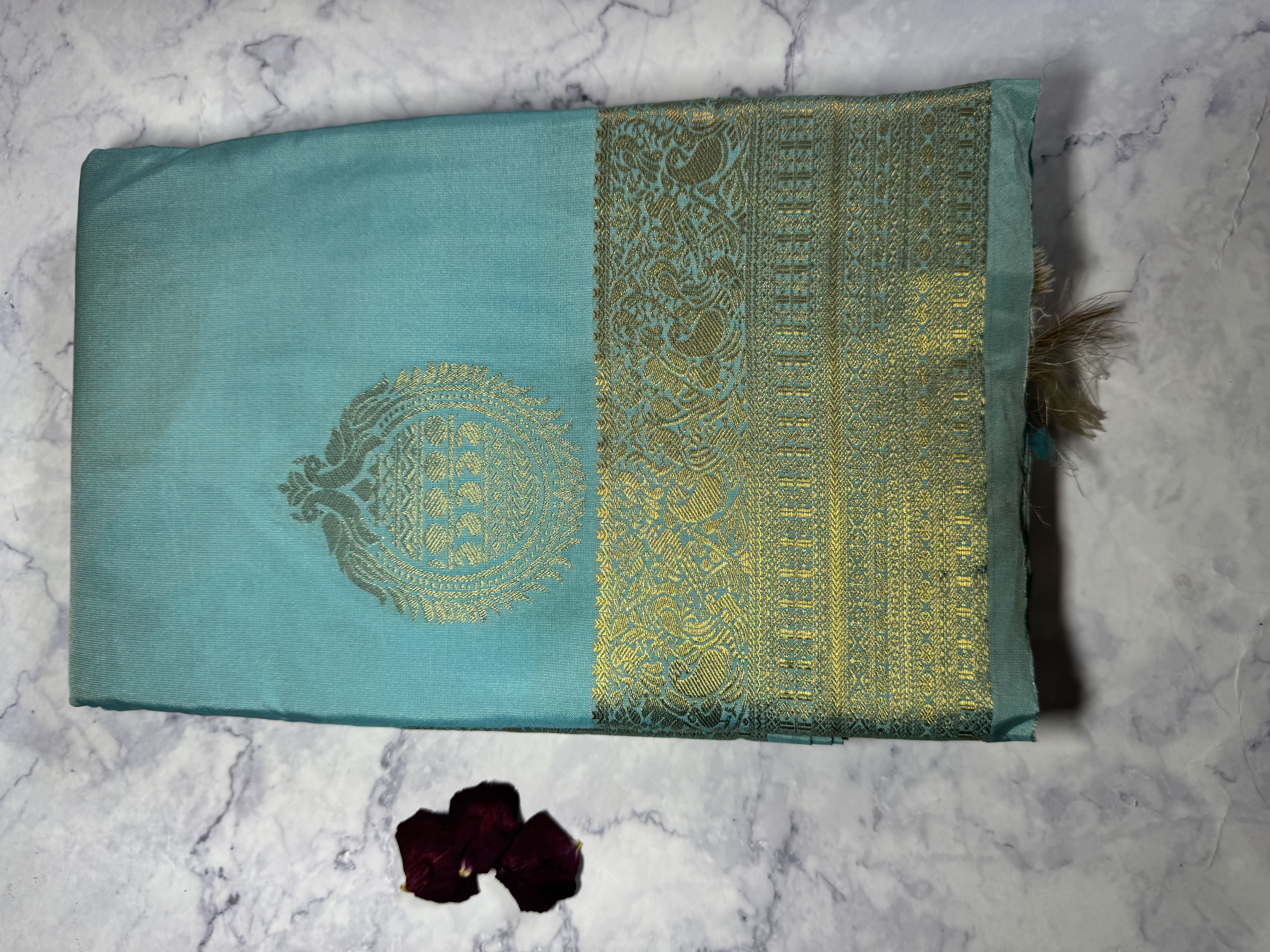 Sky blue semi silk with round buttas