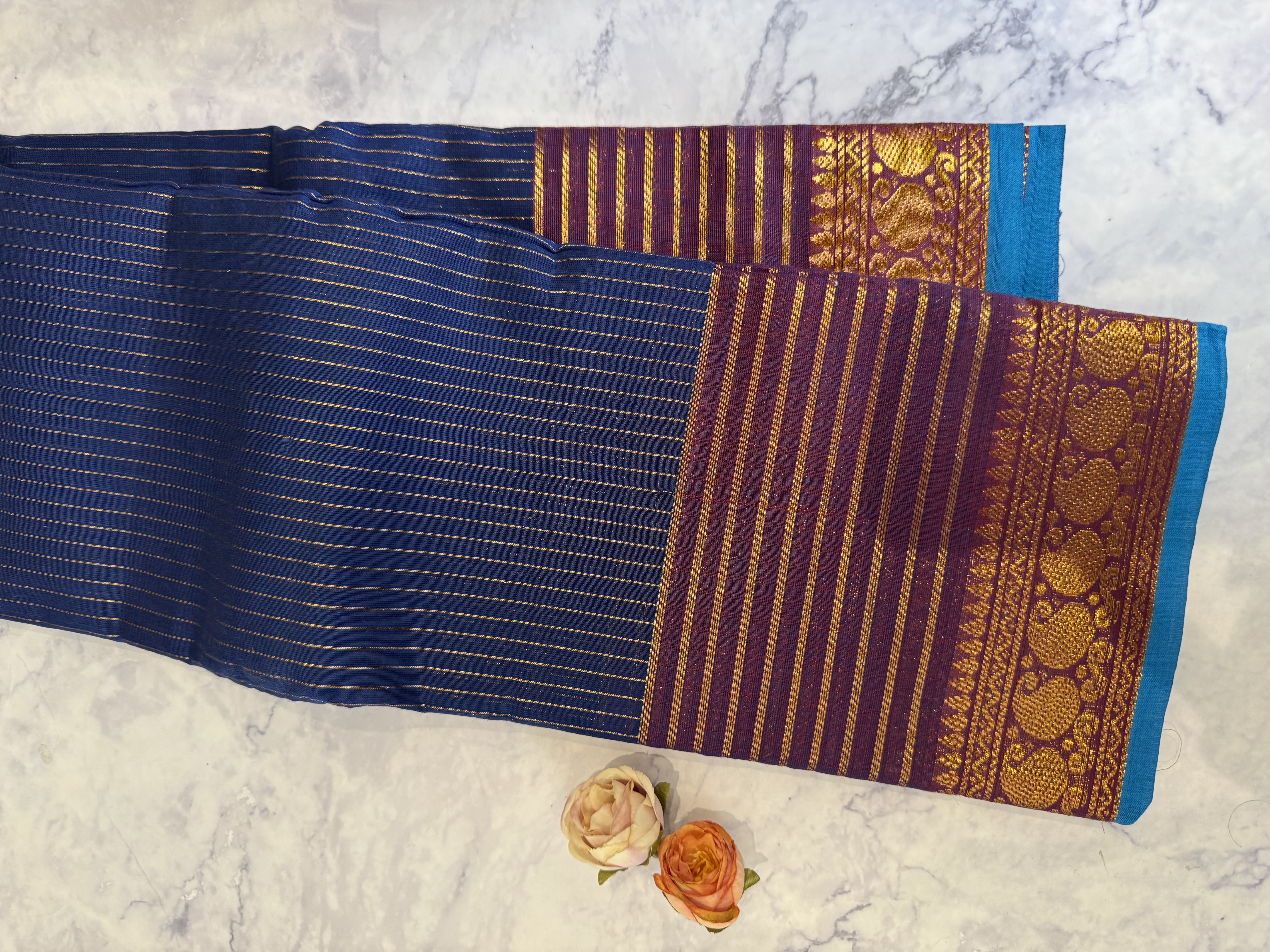 Navy blue vaira oosi cotton saree with yellow rim