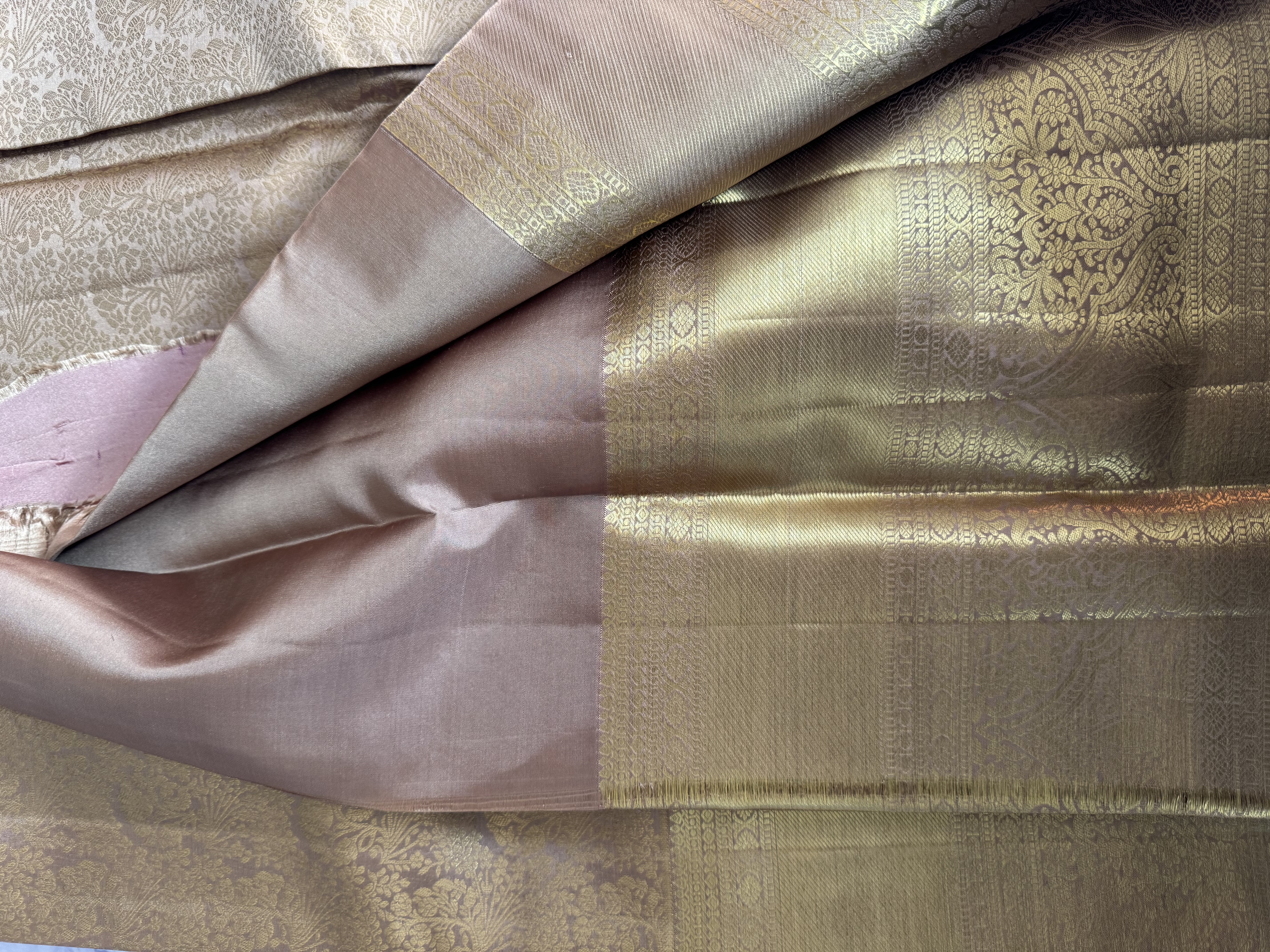 Beige pure silk saree with heavy gold work