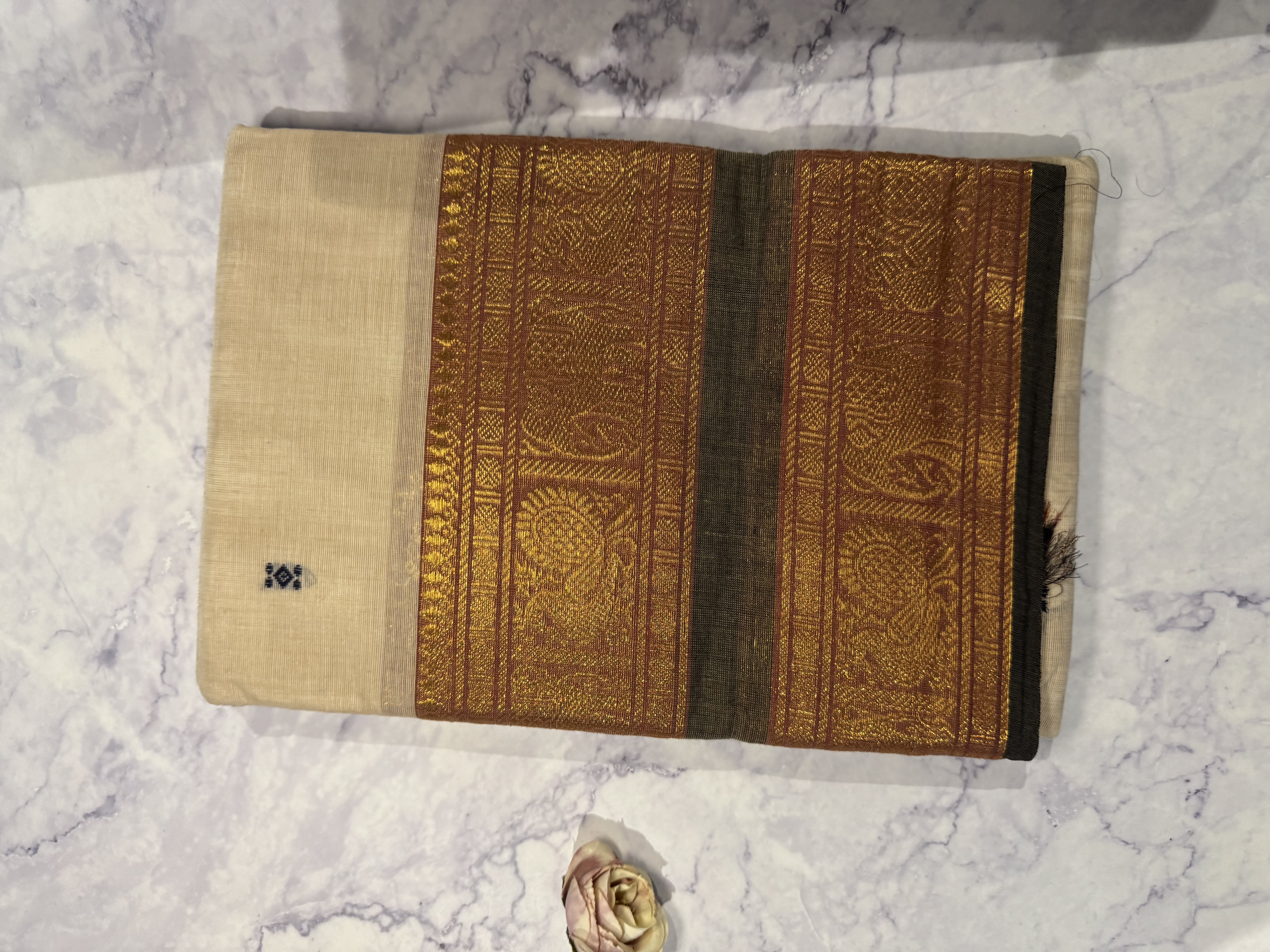 Beige cotton saree with green border