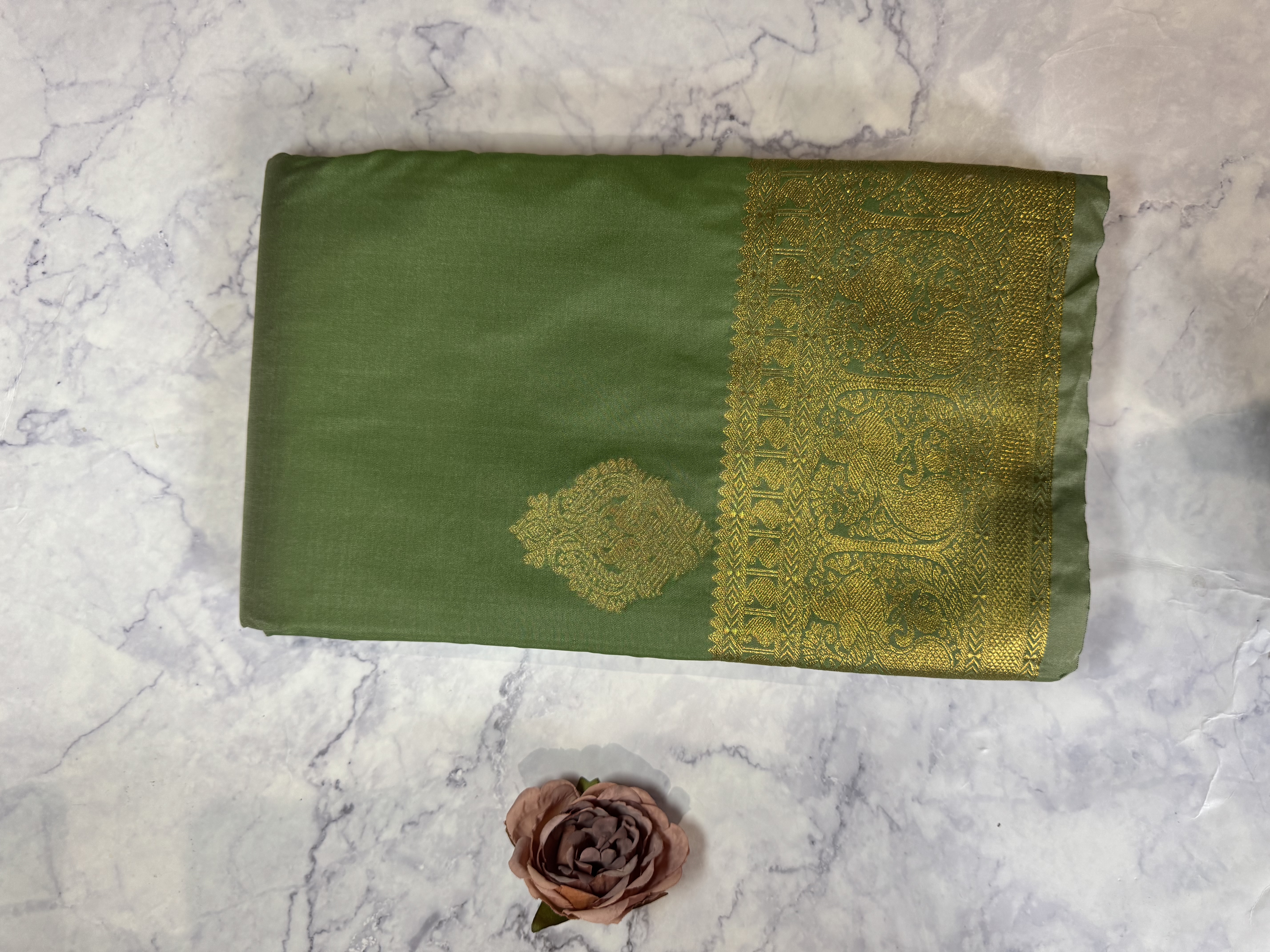 Sage green semi silk saree with medium buttas