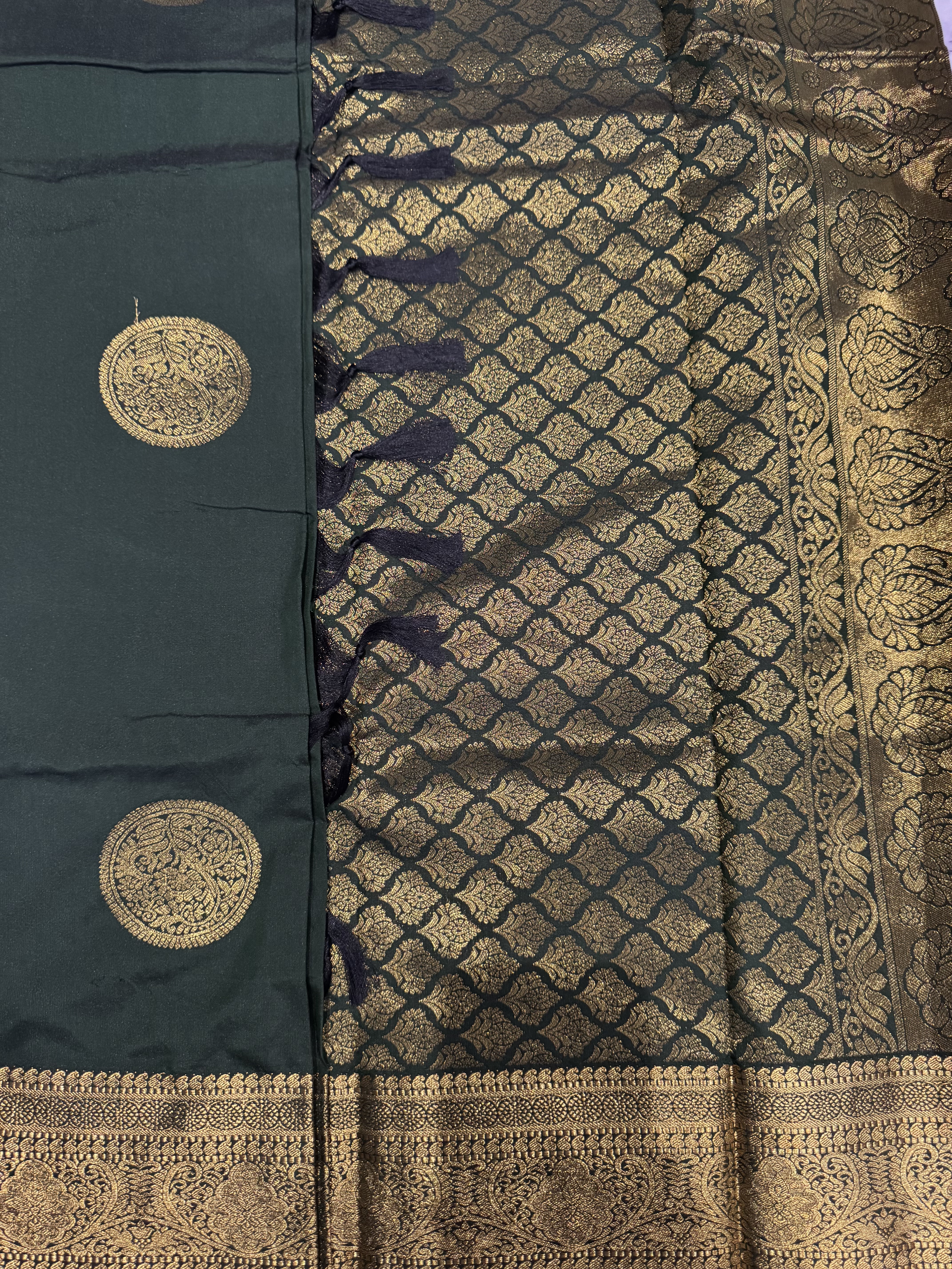 Forest green semi silk saree with round butta
