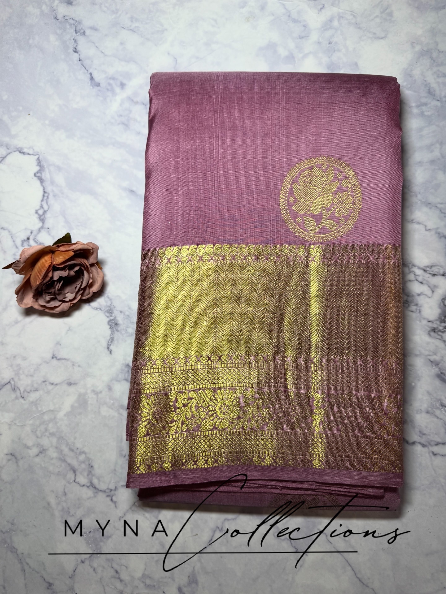 Blush pink pure silk kanchipuram with gold zari rose buttas