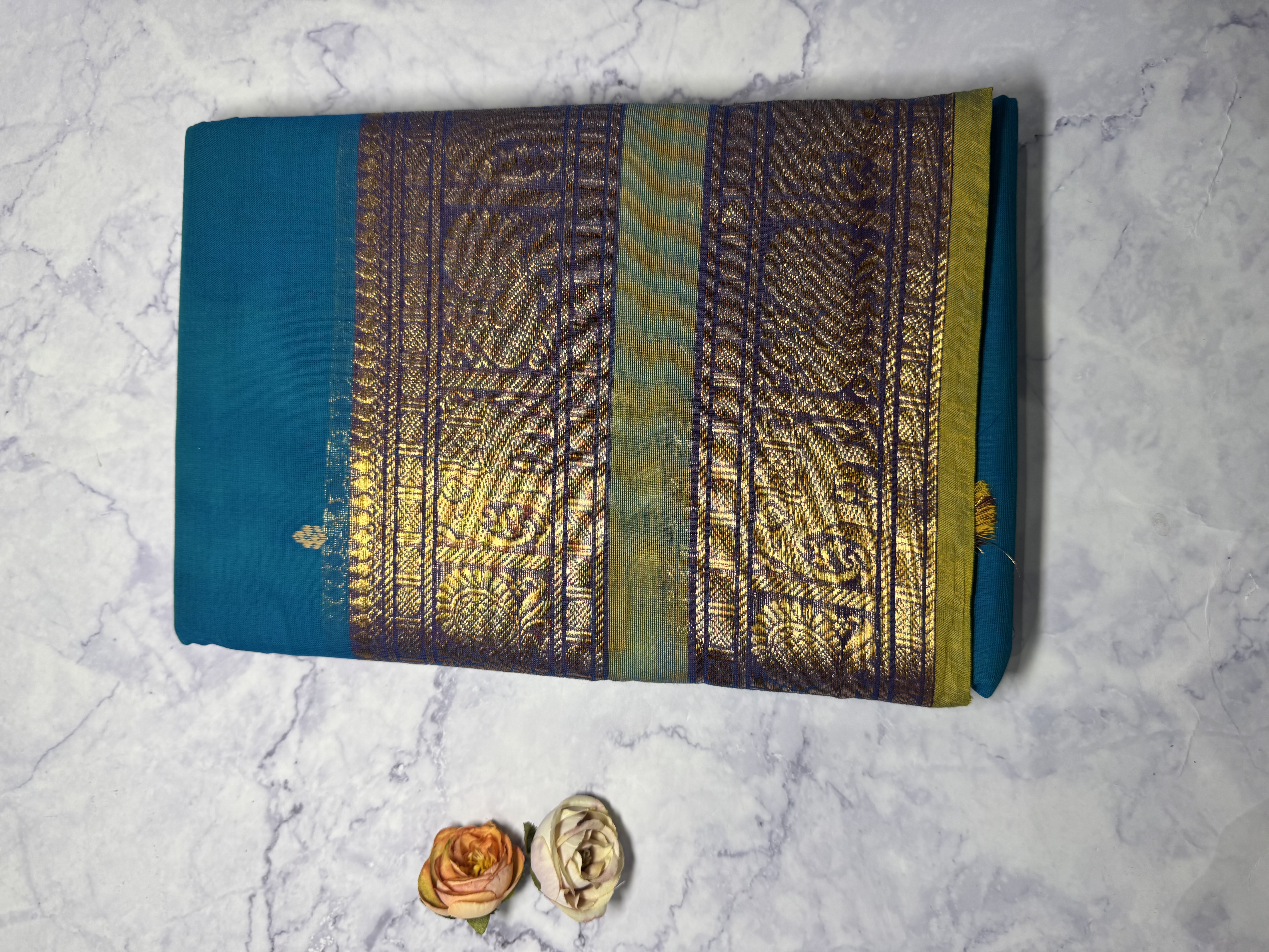 Sky blue cotton saree with lime green border