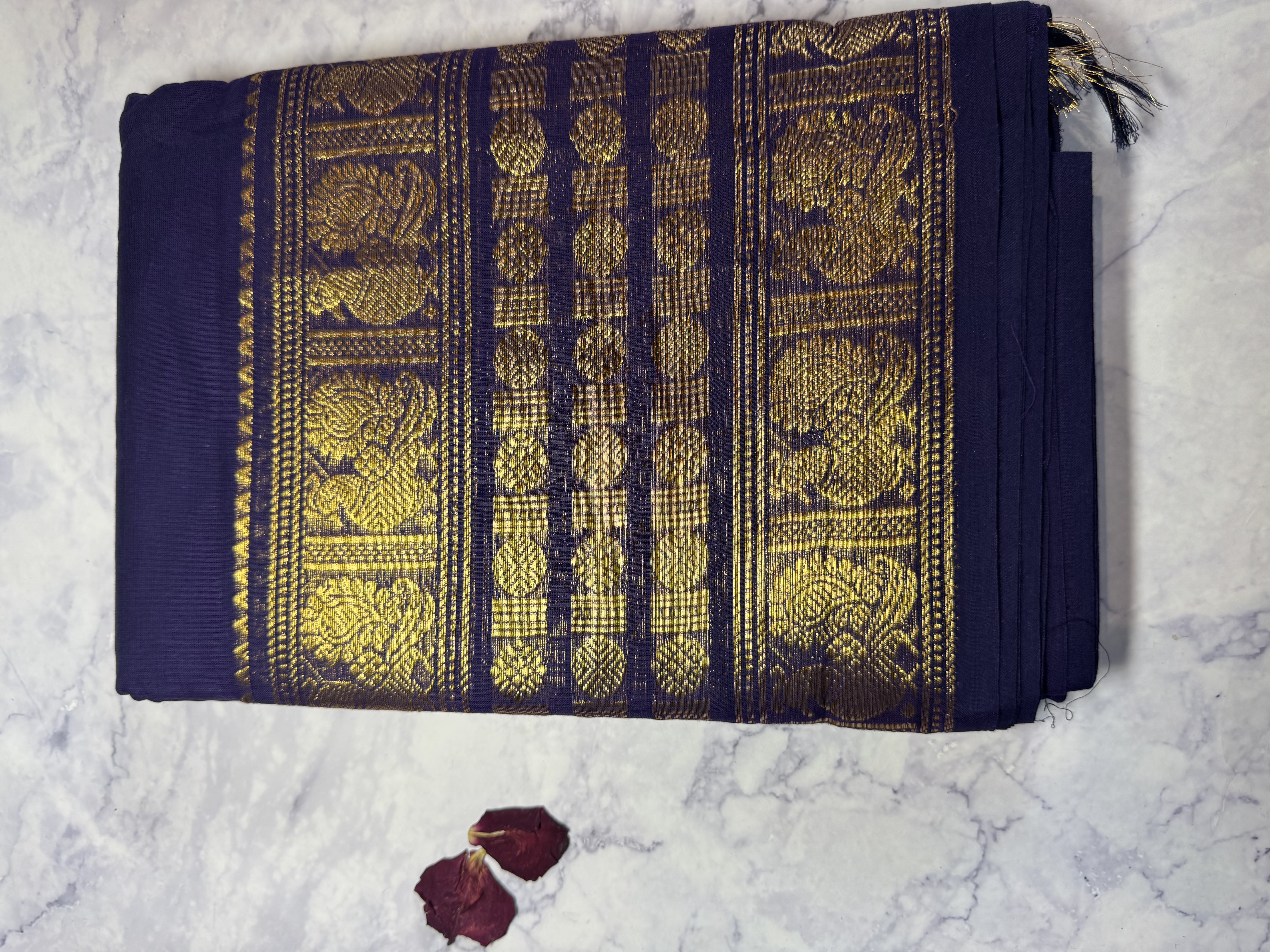 Navy blue cotton saree with large gold border