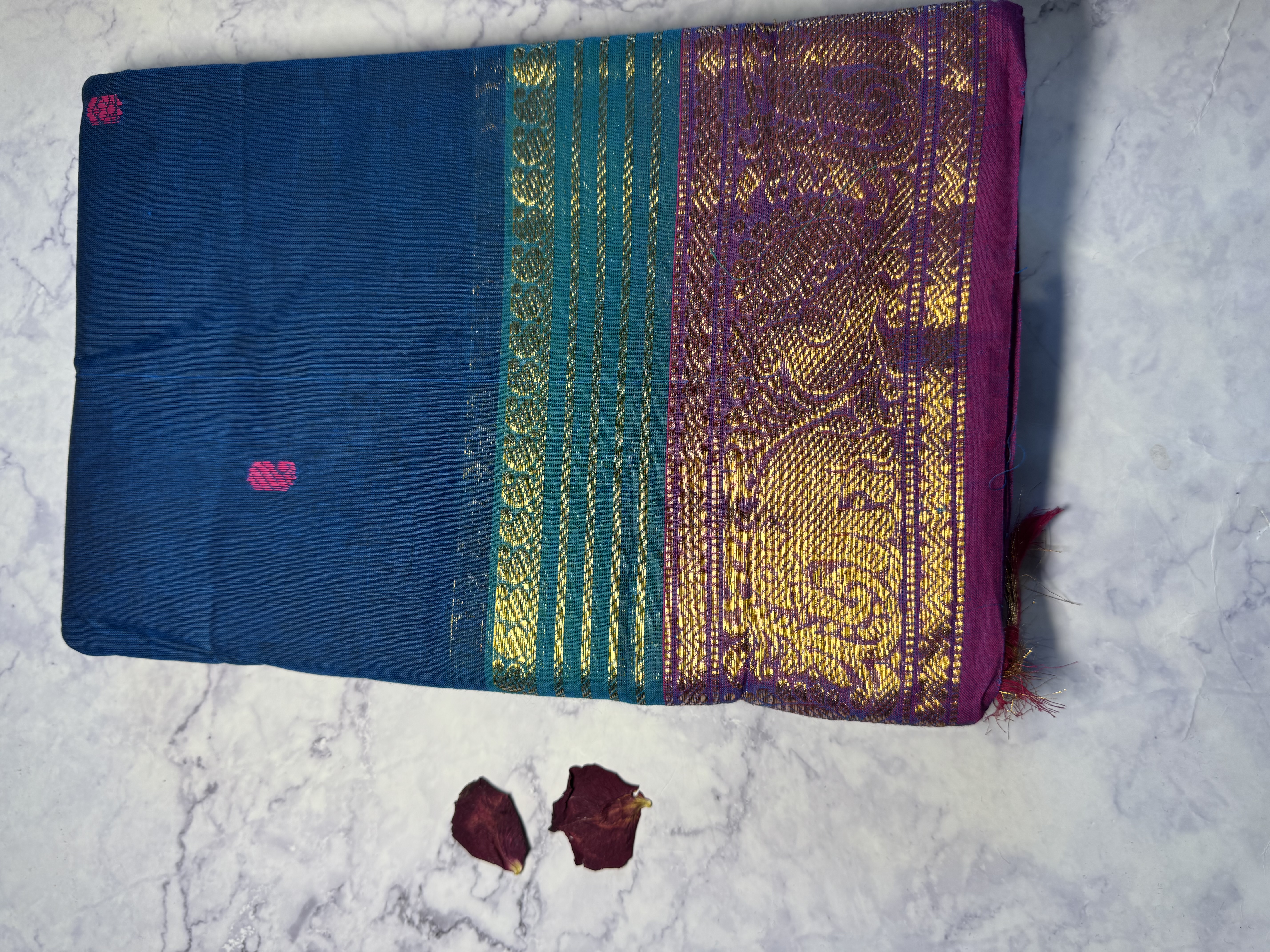 Turquoise blue cotton saree with pink and green border