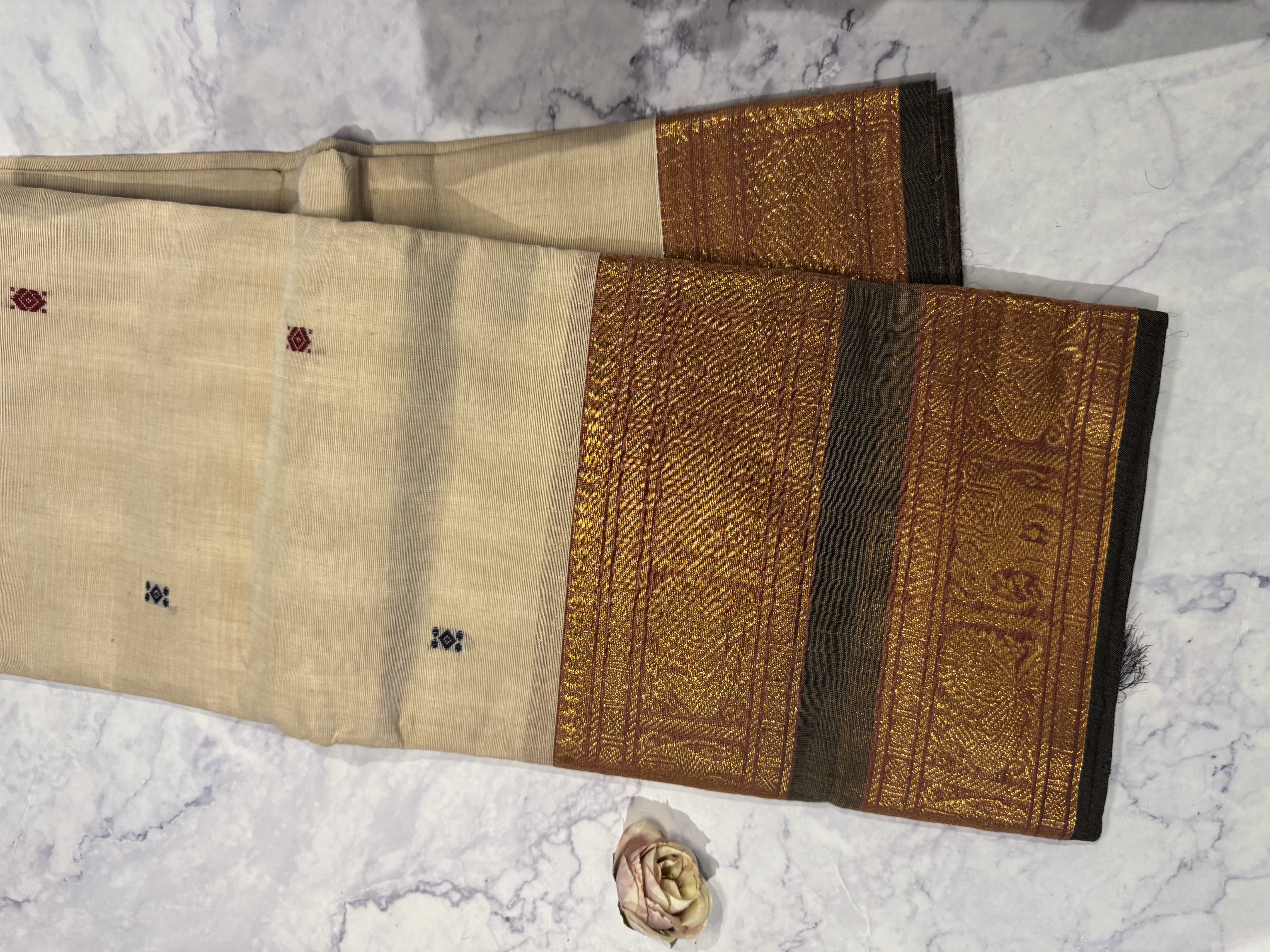 Beige cotton saree with green border