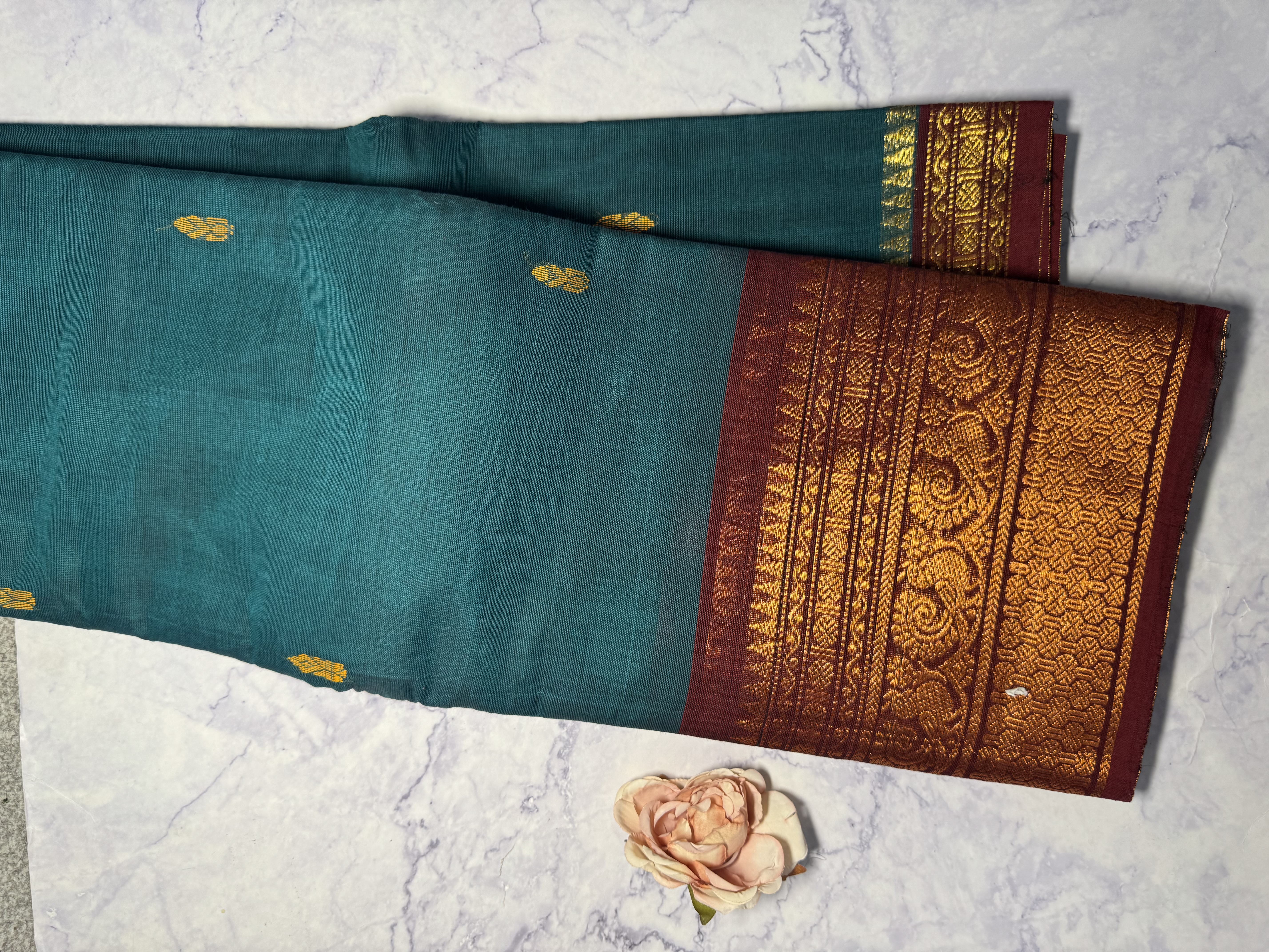 Teal cotton saree with red border