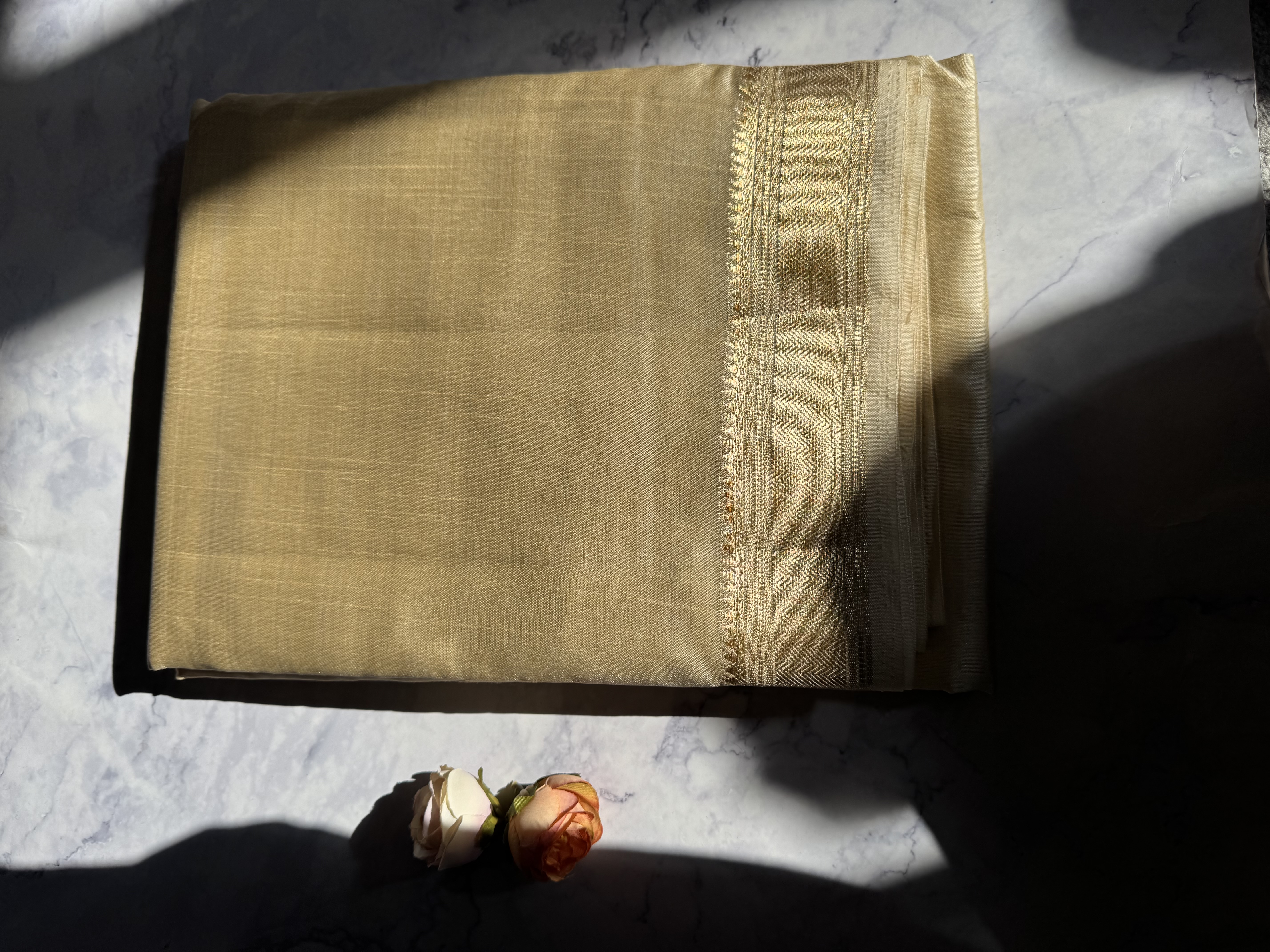 Cream mango silk saree with gold border