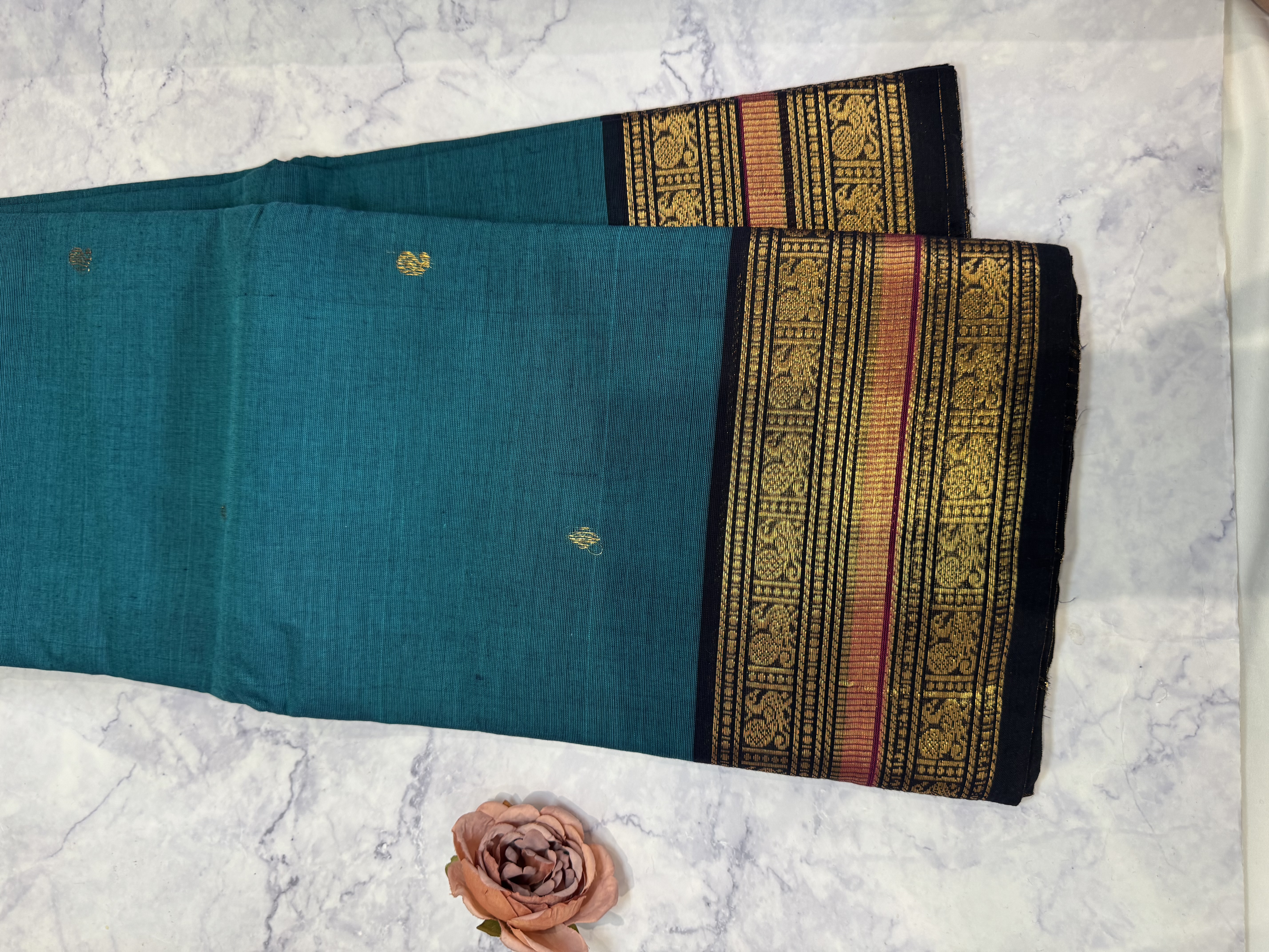 Teal blue cotton saree with black and red border