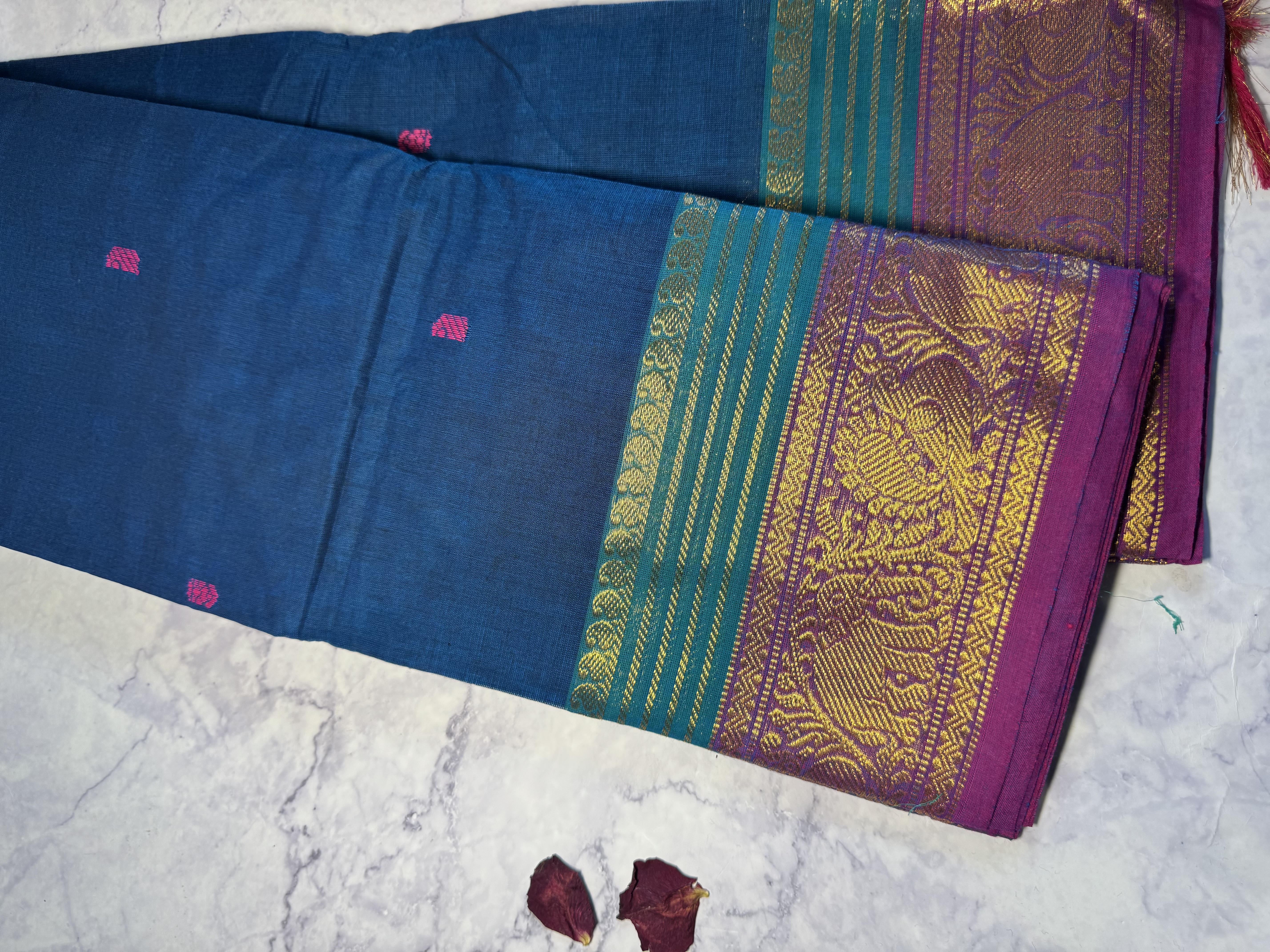 Turquoise blue cotton saree with pink and green border
