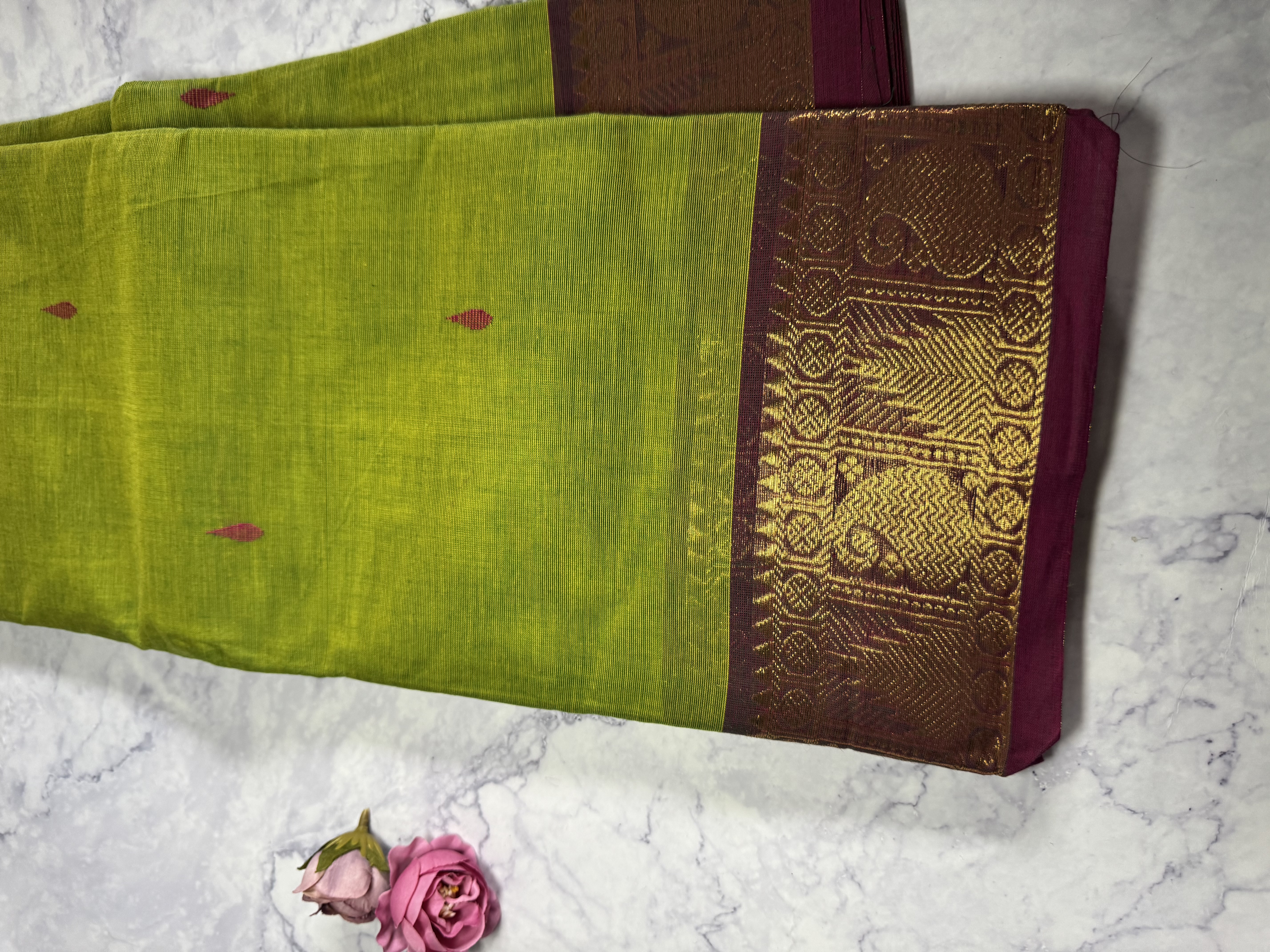 Parrot green cotton saree with pink border
