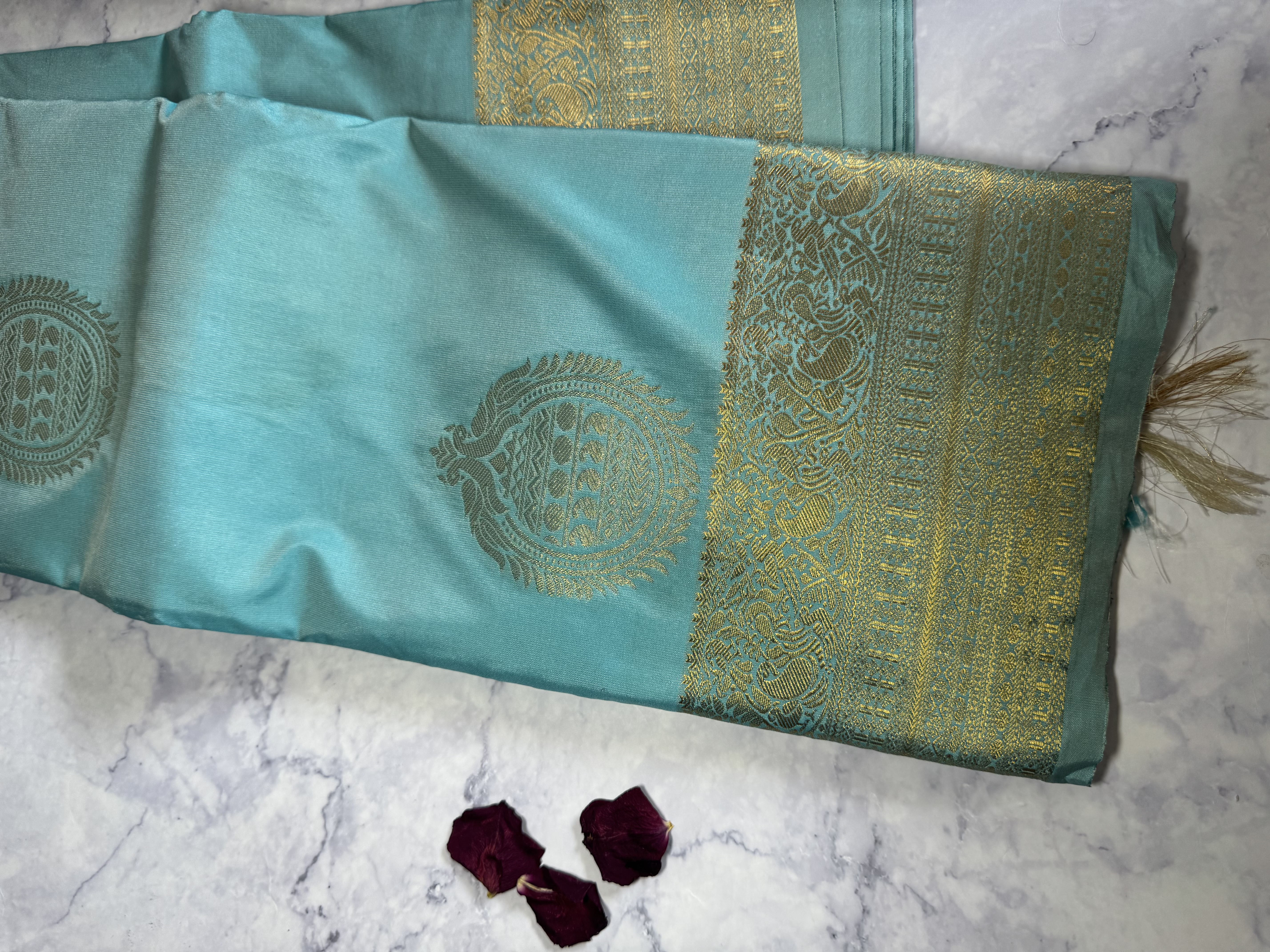 Sky blue semi silk with round buttas