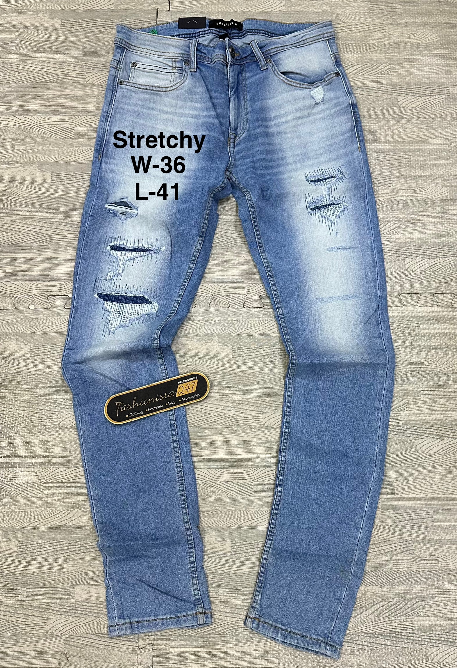 Distressed Blue Jeans