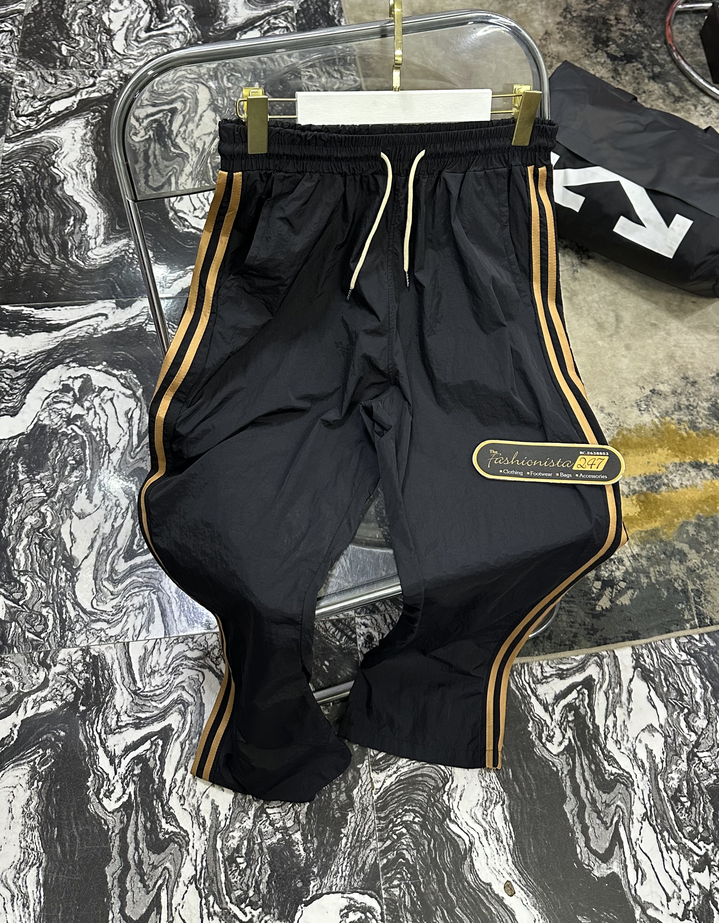 Black Track Pants with Gold Stripes