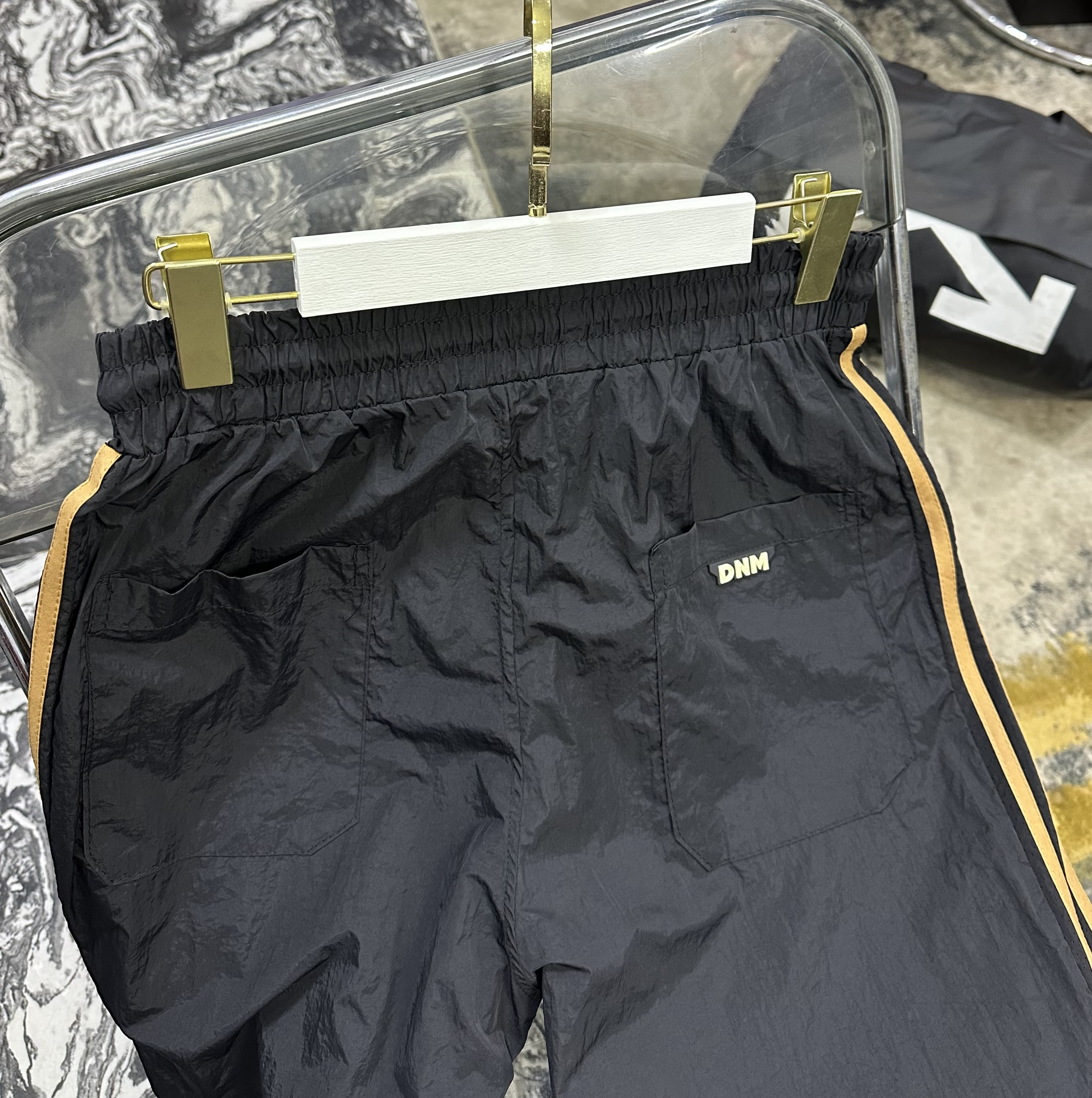 Black Track Pants with Gold Stripes