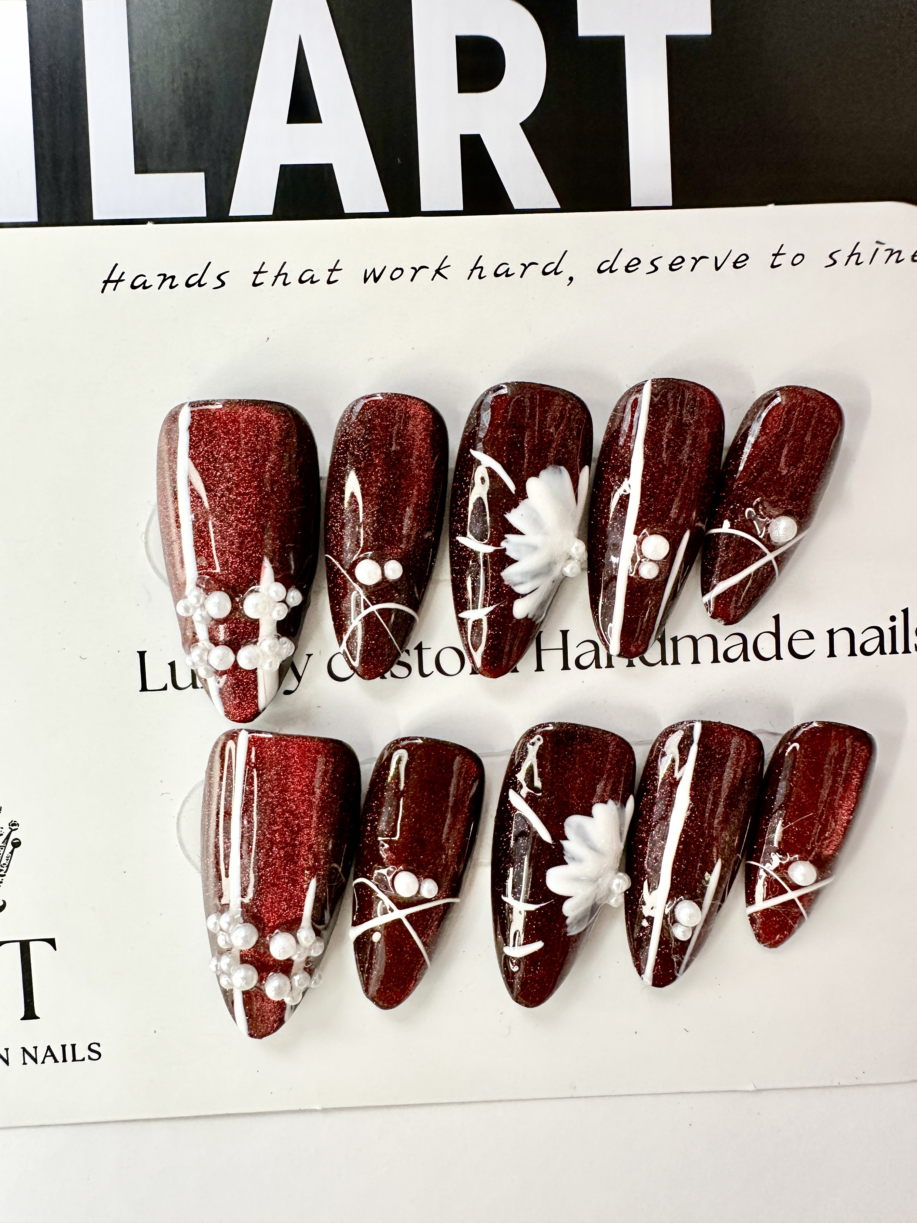 "Crimson Blossom" — Red Cat-Eye Base & White Hand-Painted Flower Press-On Nails
