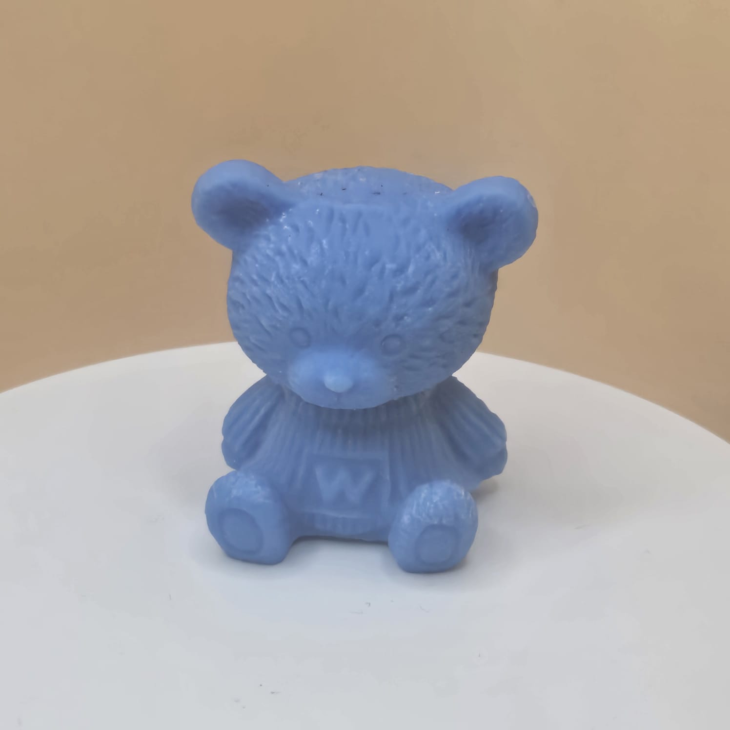 Capsule Nours bleu saphire