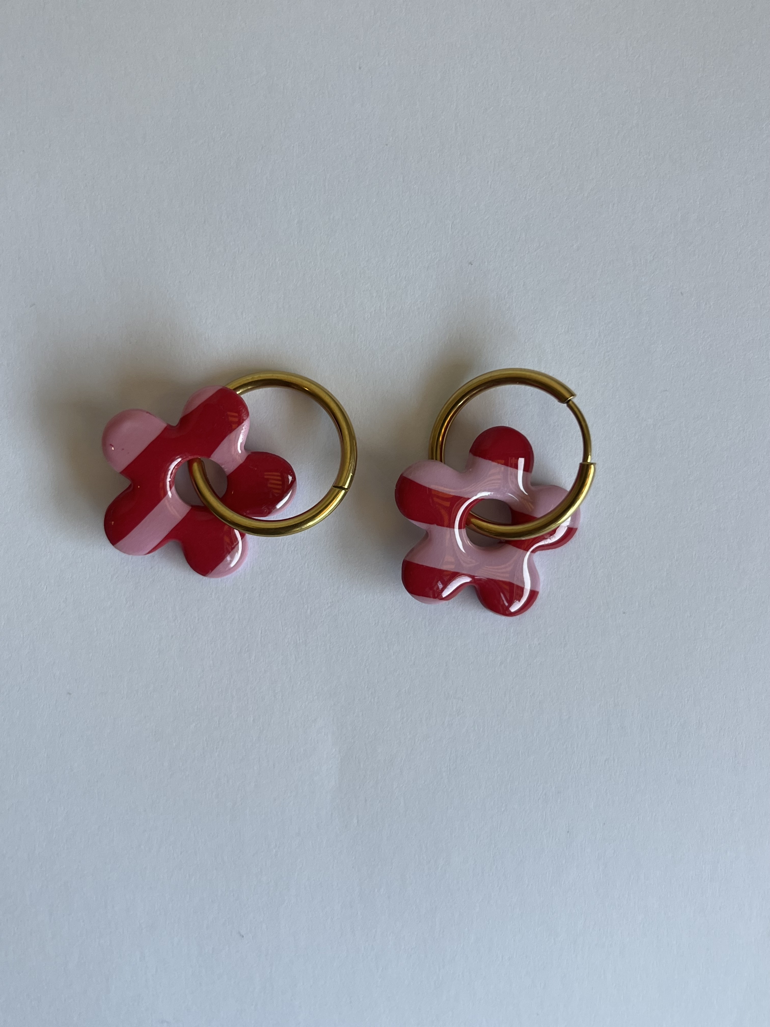 Aro charms rosa y rojo 