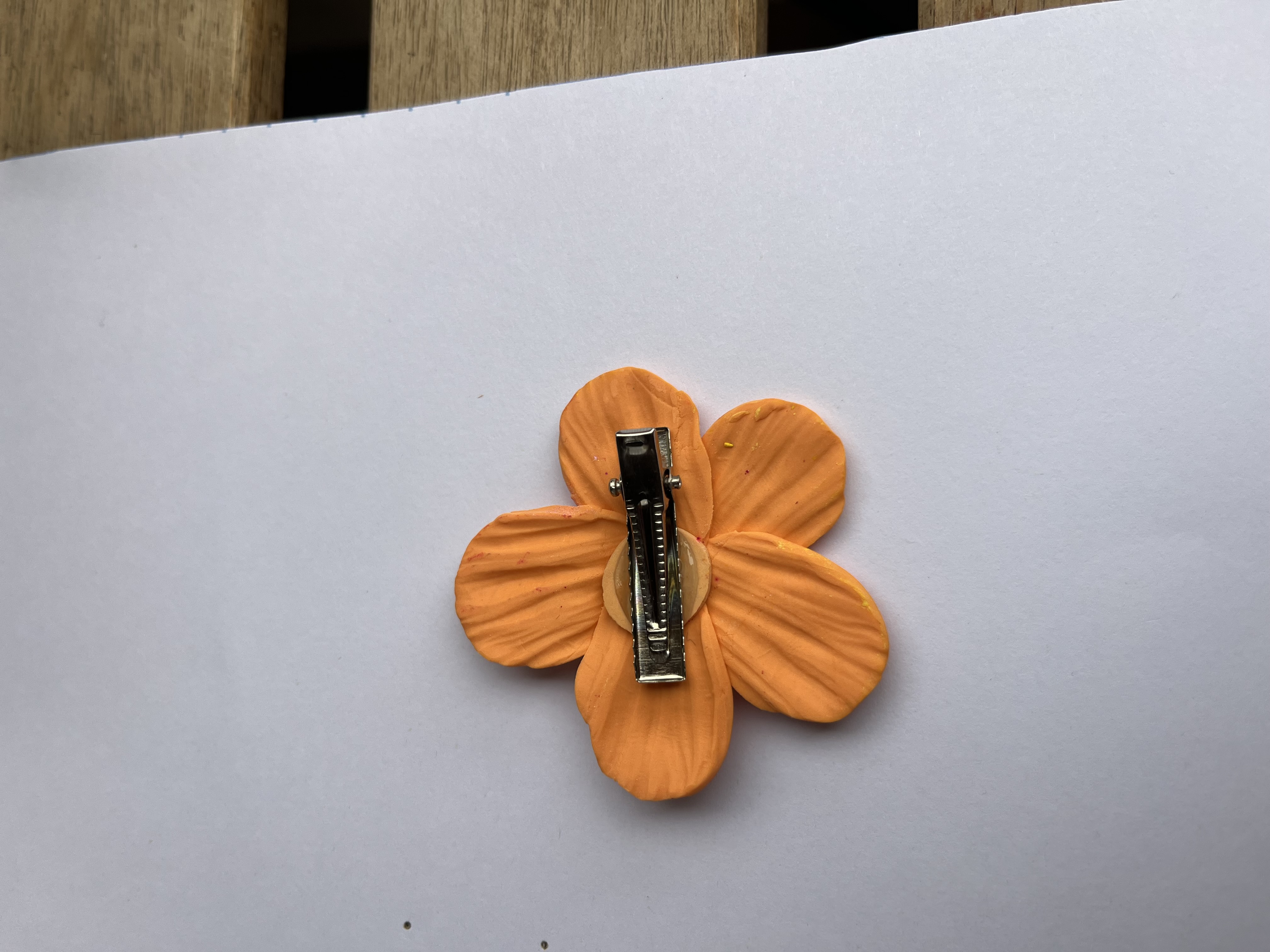 Pinza hibisco naranja 