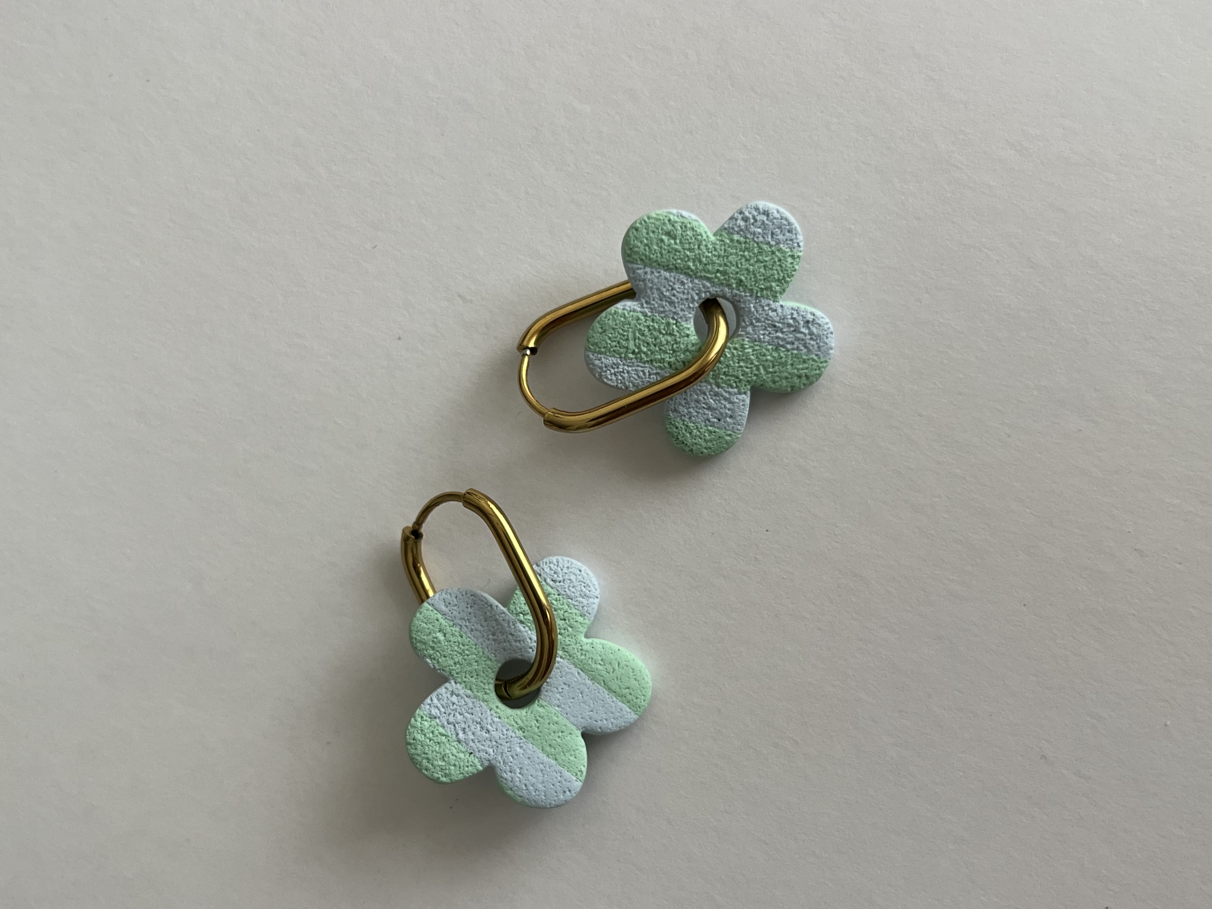 Aros flor rayas