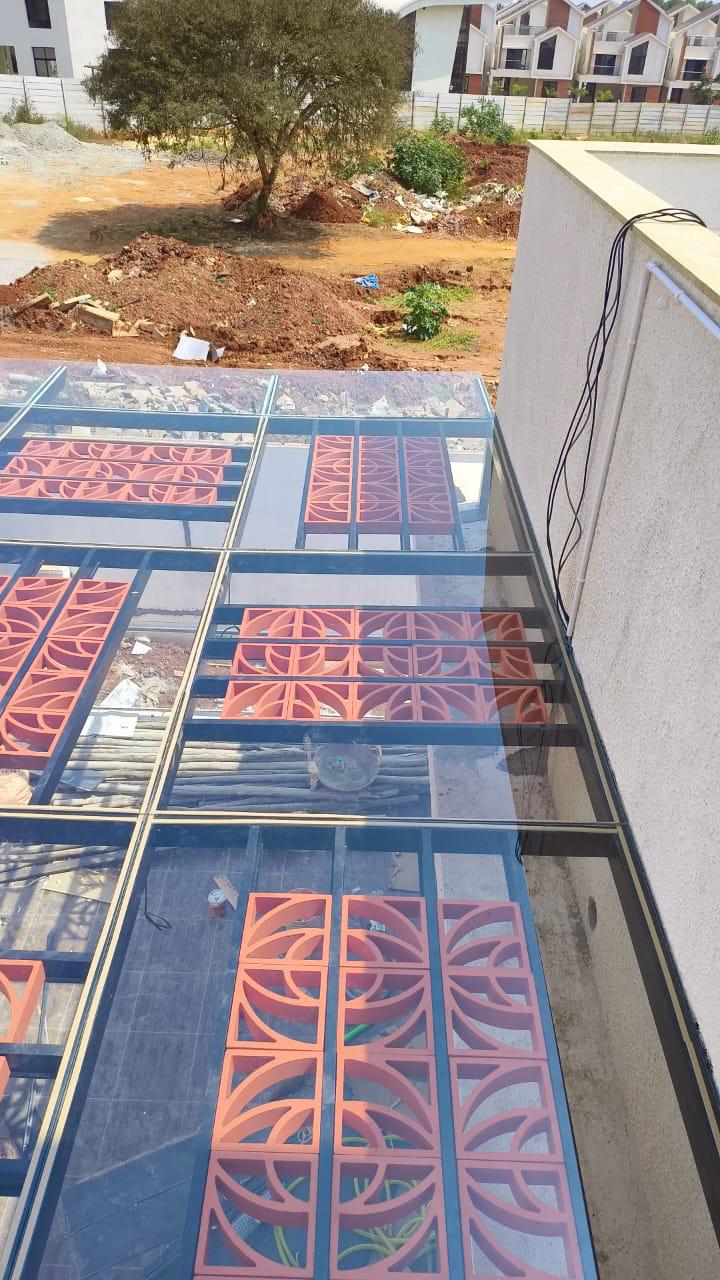 Glass Pergola with Terracotta Jalli - 10'X10'
