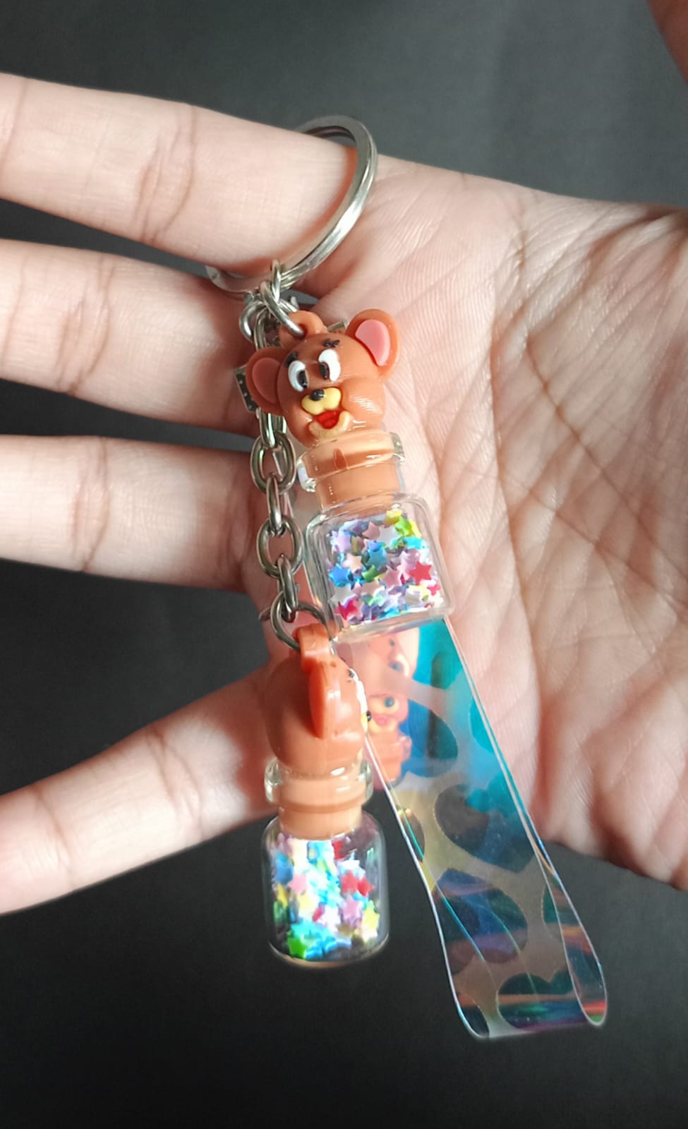 Jerry with a  glitter bottle 