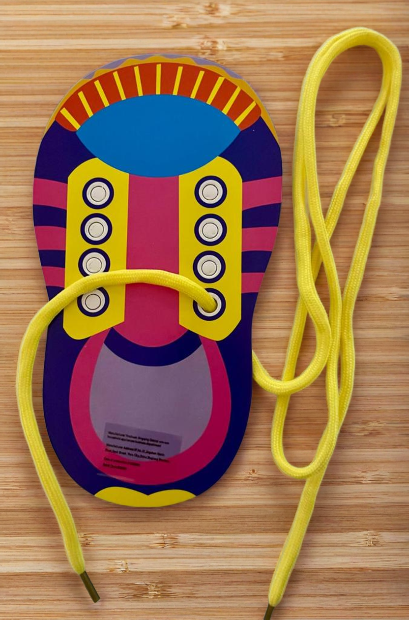 Tablero para aprender a atarse los cordones