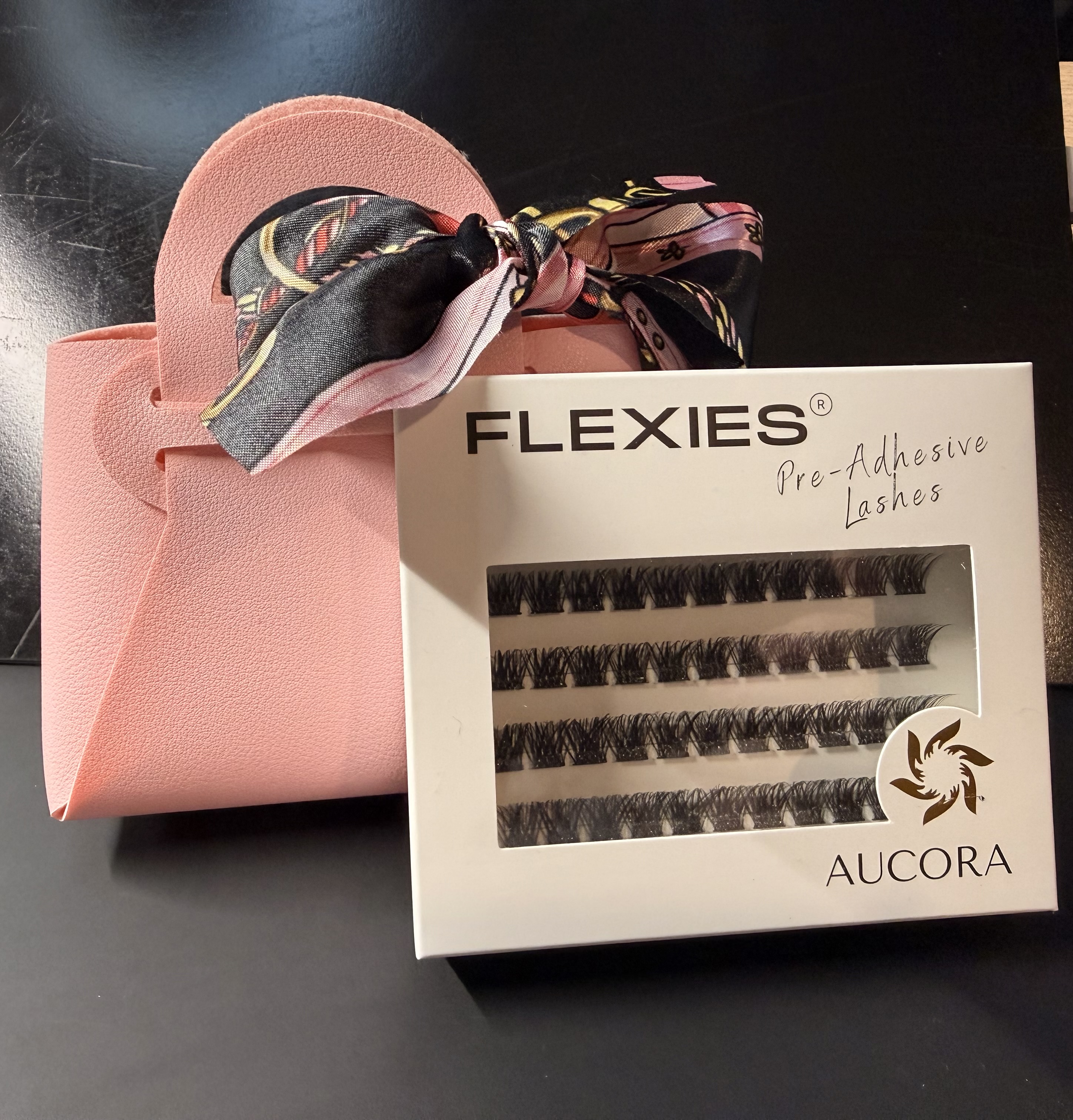 FLEXIES Pre-Adhesive Lashes by AUCORA with a cute mini storage handbag bag charm