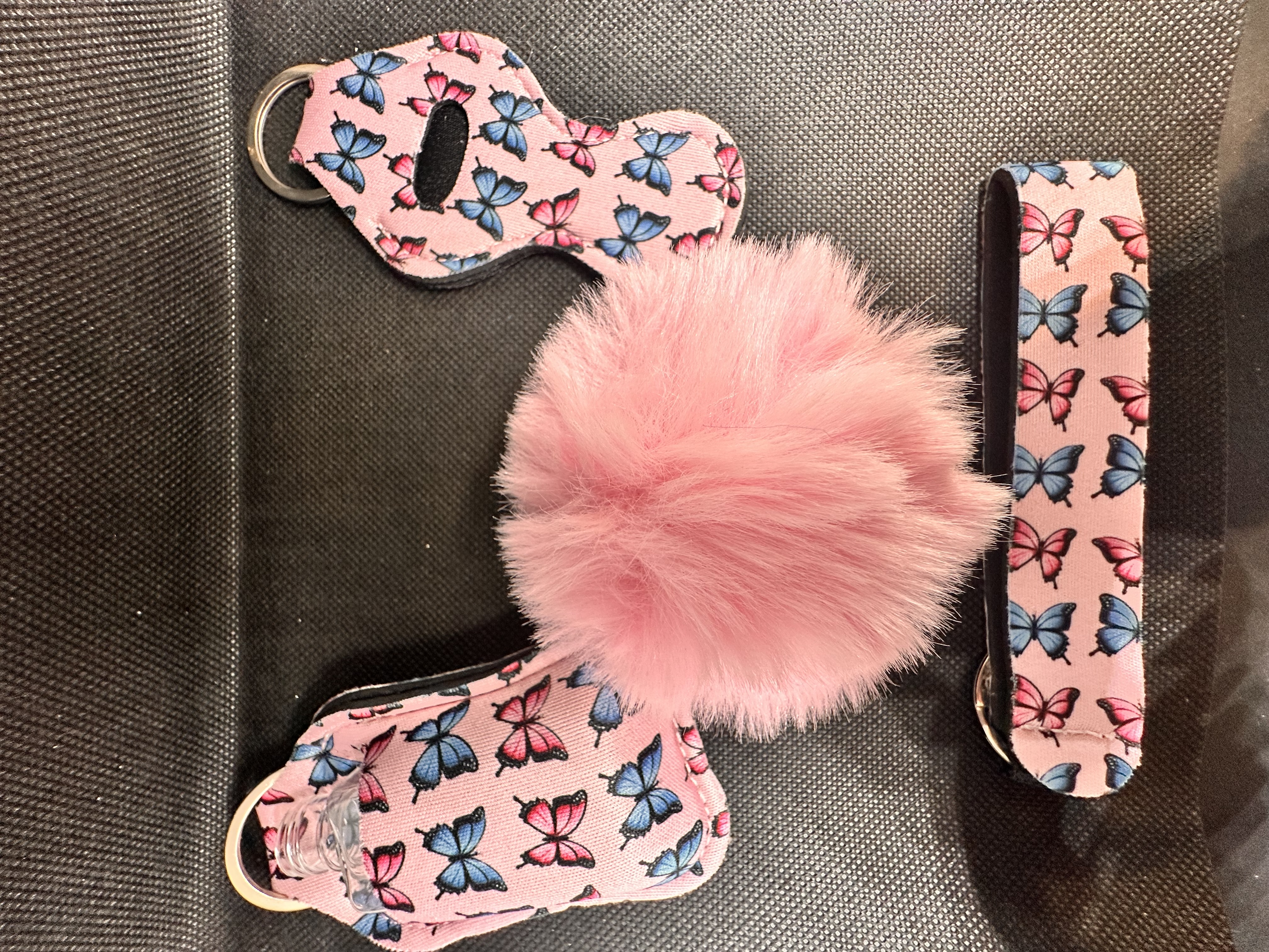 Pink butterfly lipstick & sanitiser holder pompom keychain