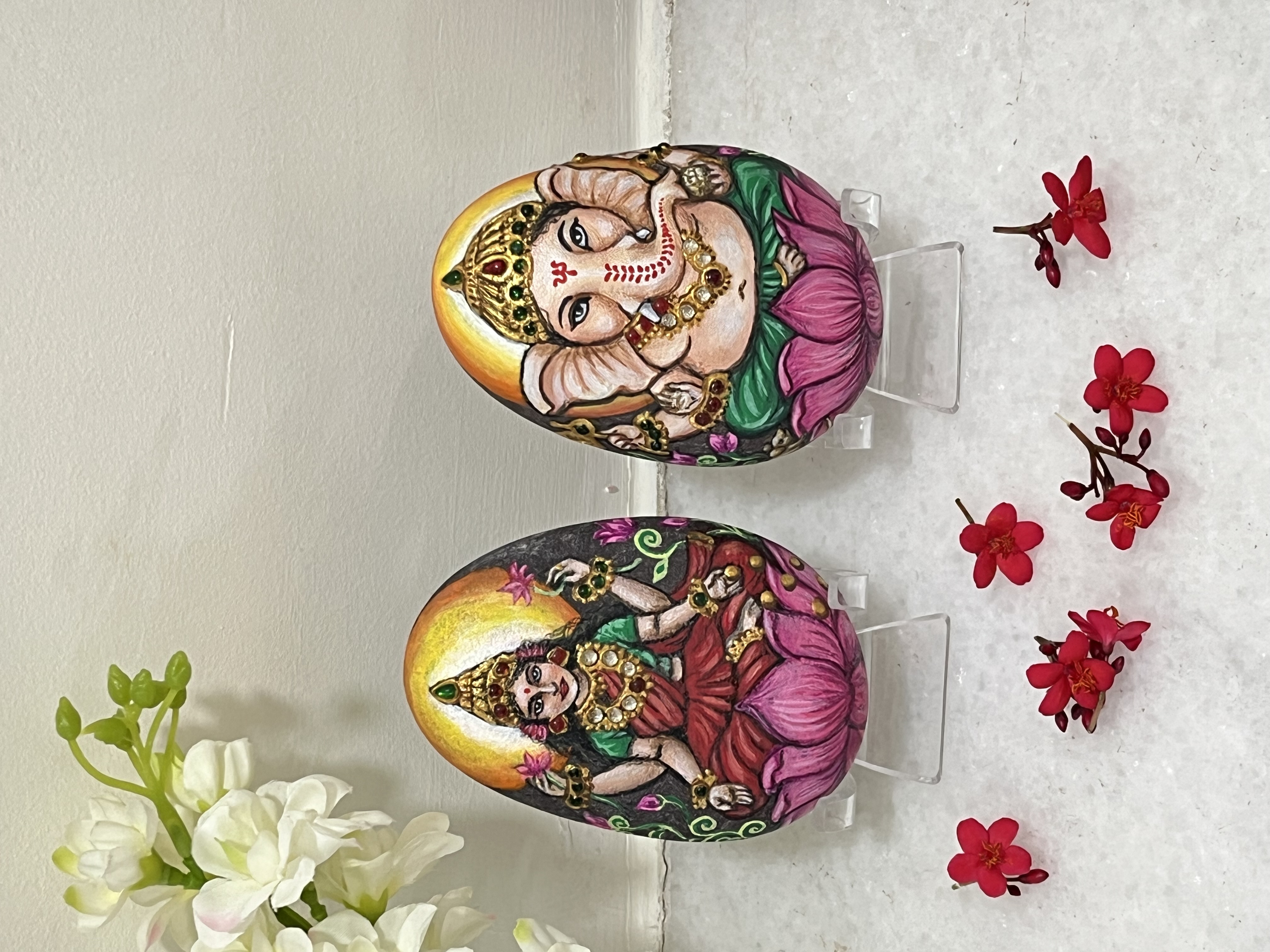 Hand-painted Ganesh and Lakshmi Decorative Stones - unique divine art | spiritual gifts