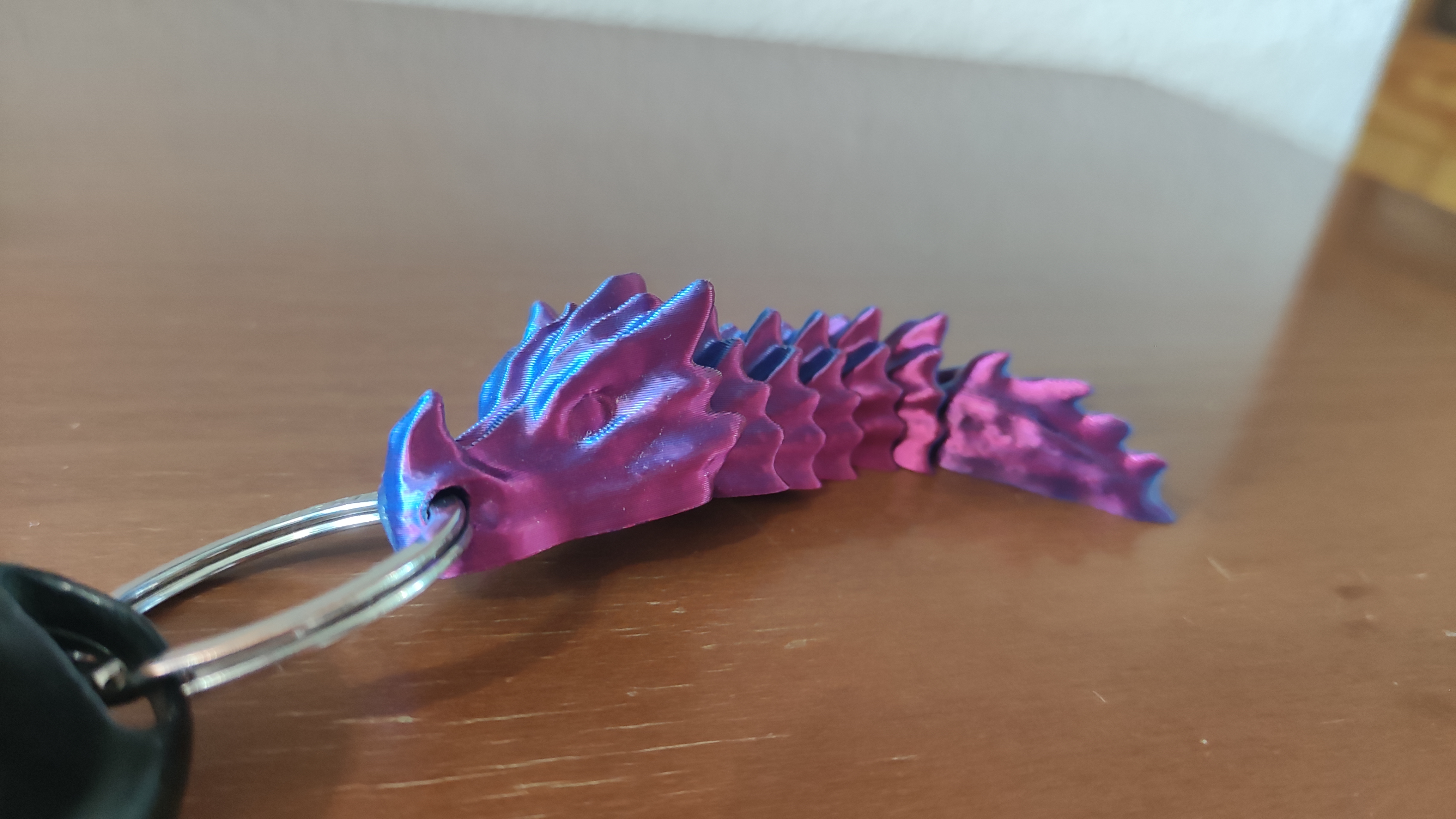 Llavero dragón articulado