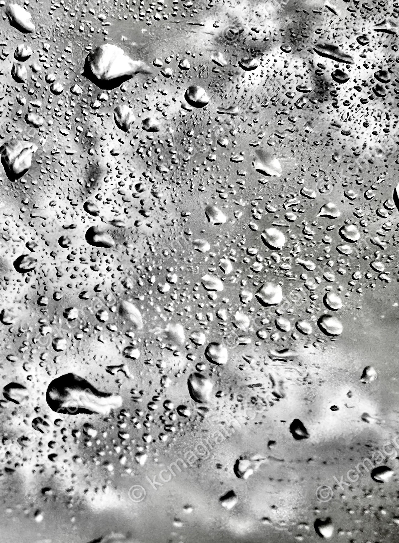 Water on glass train window, Destrehan, Louisiana, USA