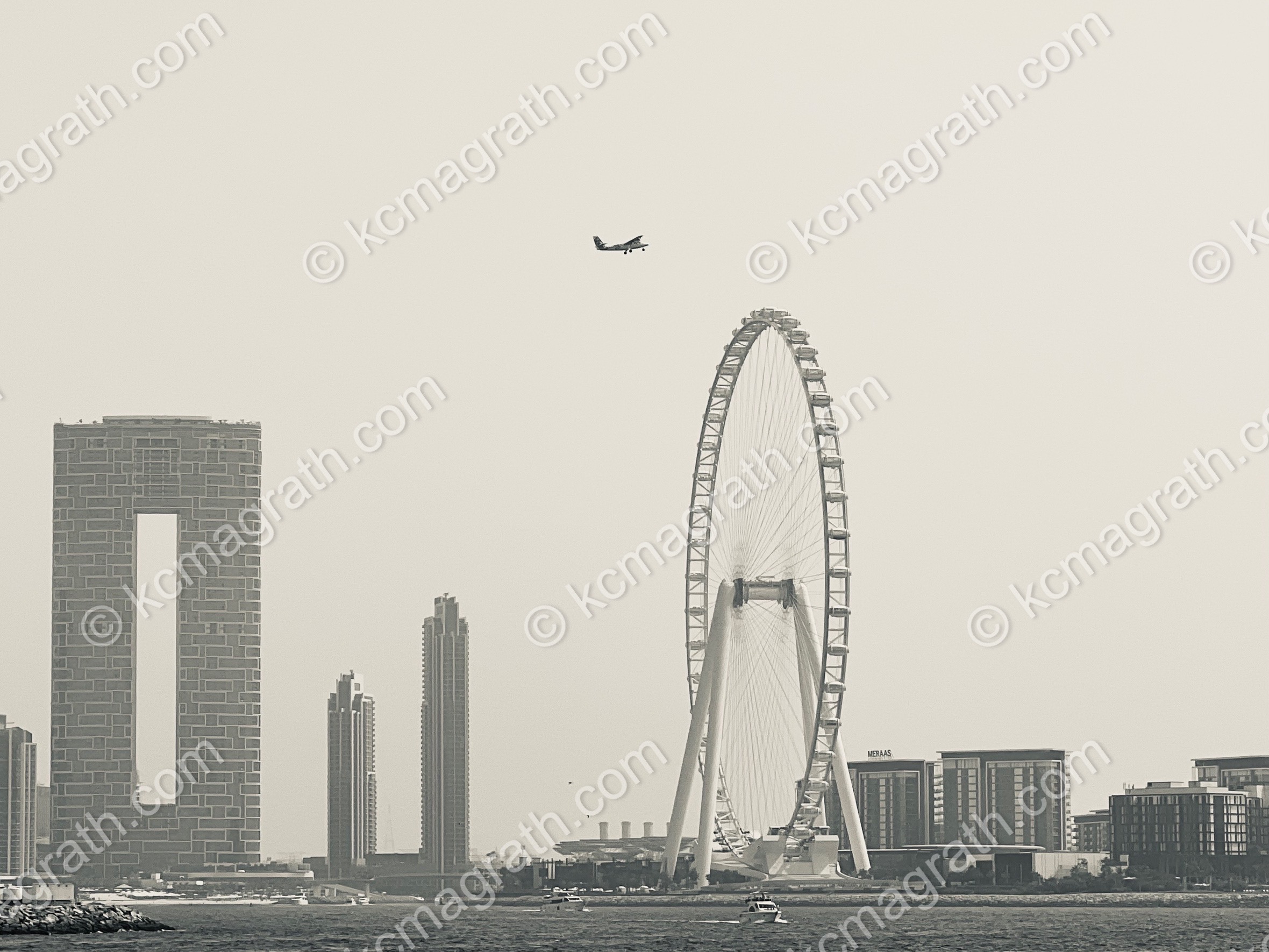 Dubai's Skyline with Ain Dubai / Dubai Eye Taken from Dubai Harbor Cruise Terminal 2, With Plane, B&W, UAE