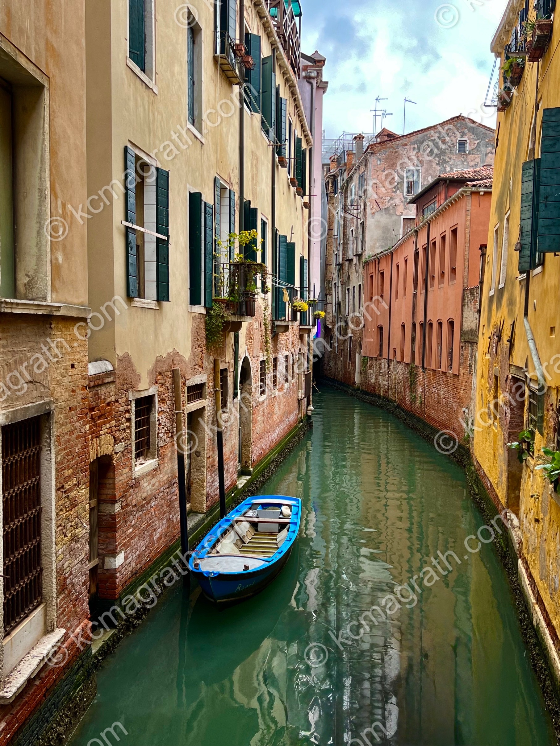 Venice's Rio della Madonnetta Canal Homes with Boat, Italy