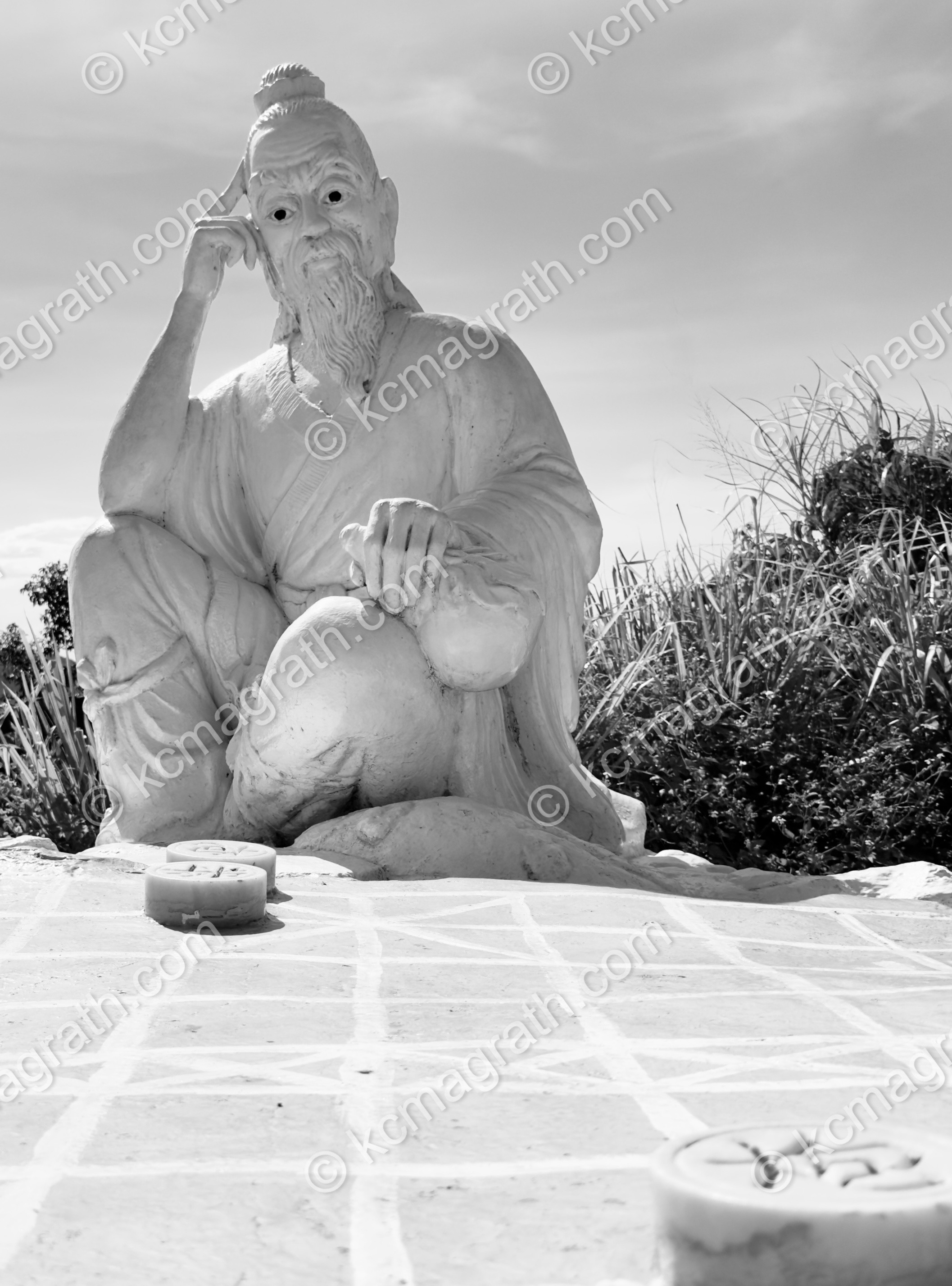 Danang's Ban Dao Son Tra Statue Representing a Deity Playing a Game, B&W, Vietnam