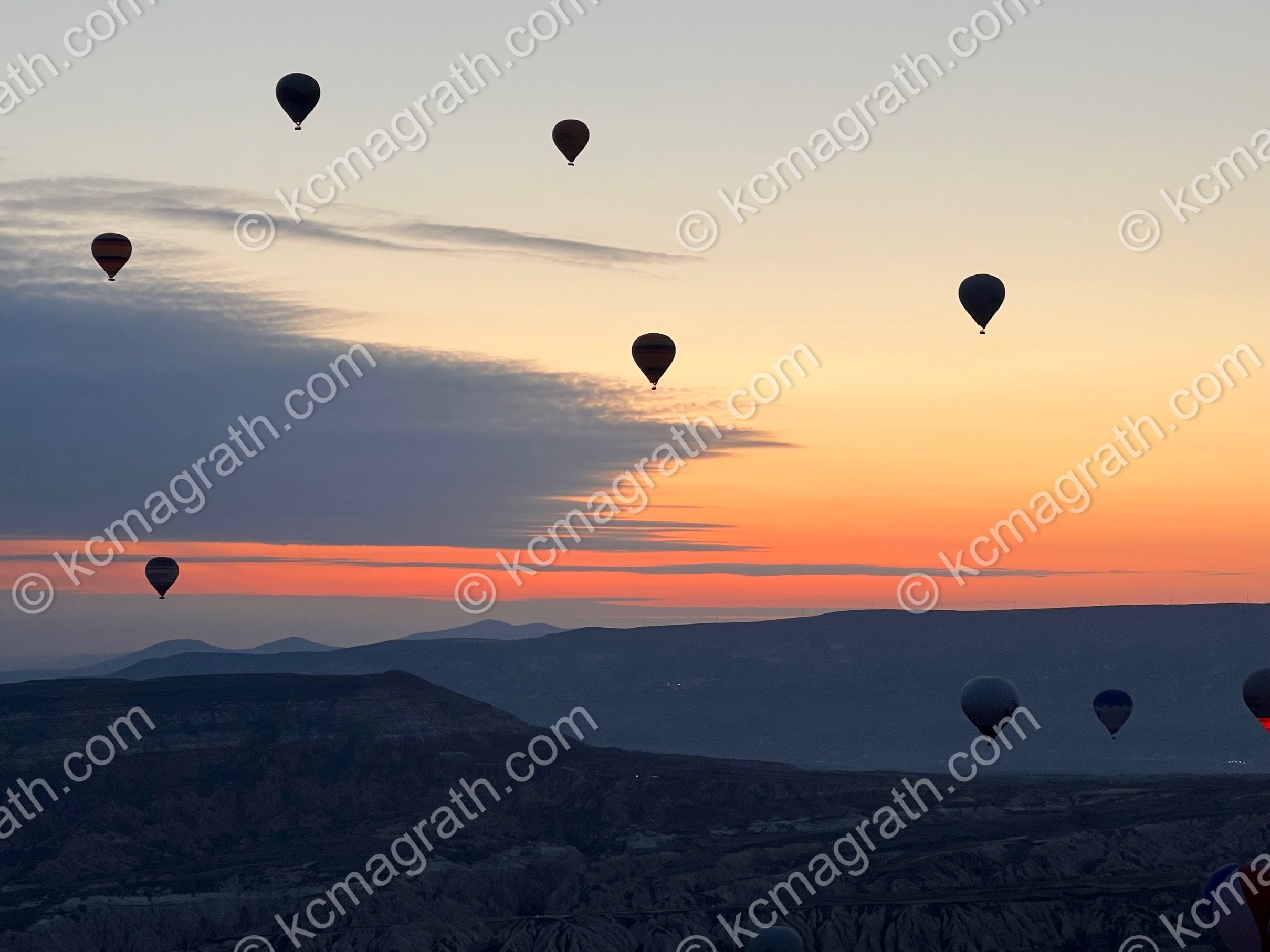 Kapadokya's Sunrise Hot Air Balloons 4 with Silhouettes of Balloons Dotting the Sky, Turkiye