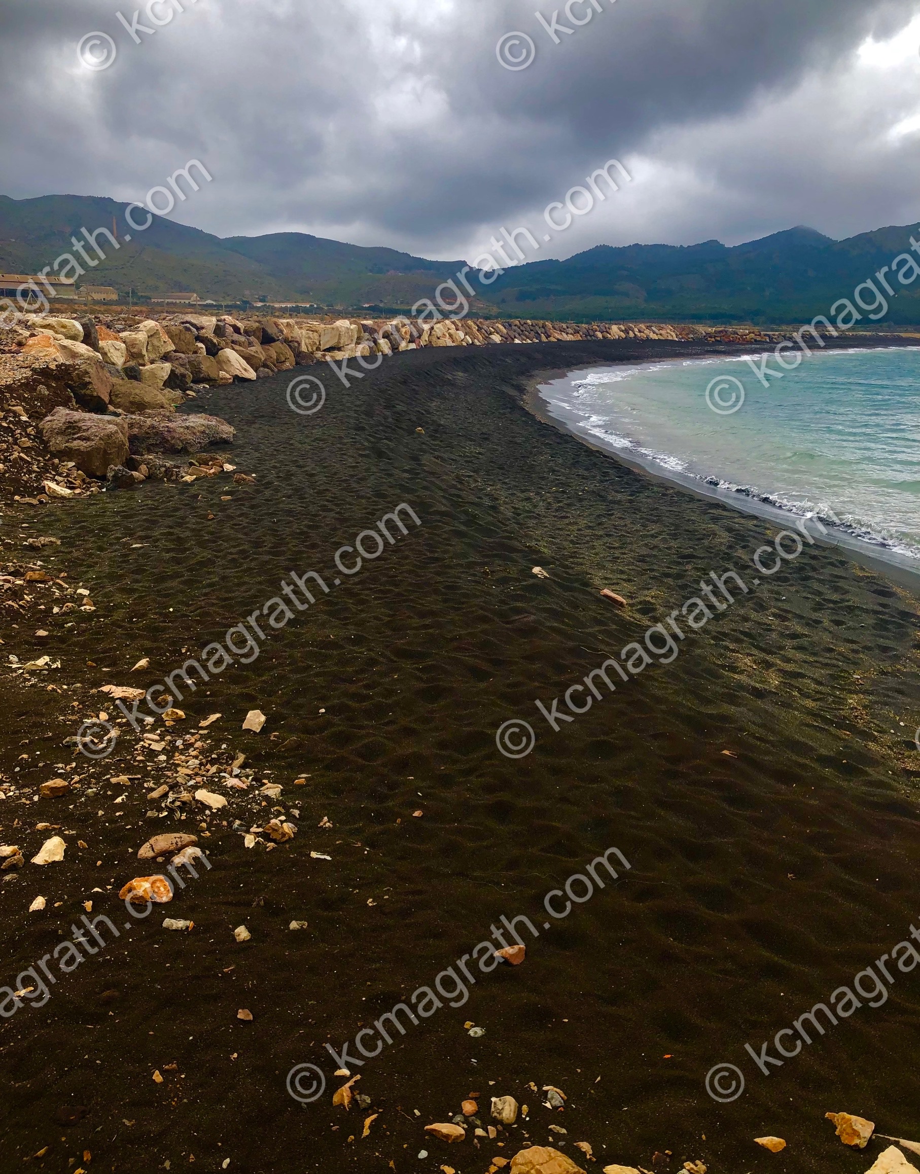 Cartagena's "Black Beach" Sands of Playa del Portman & Stormy Sky, Spain
