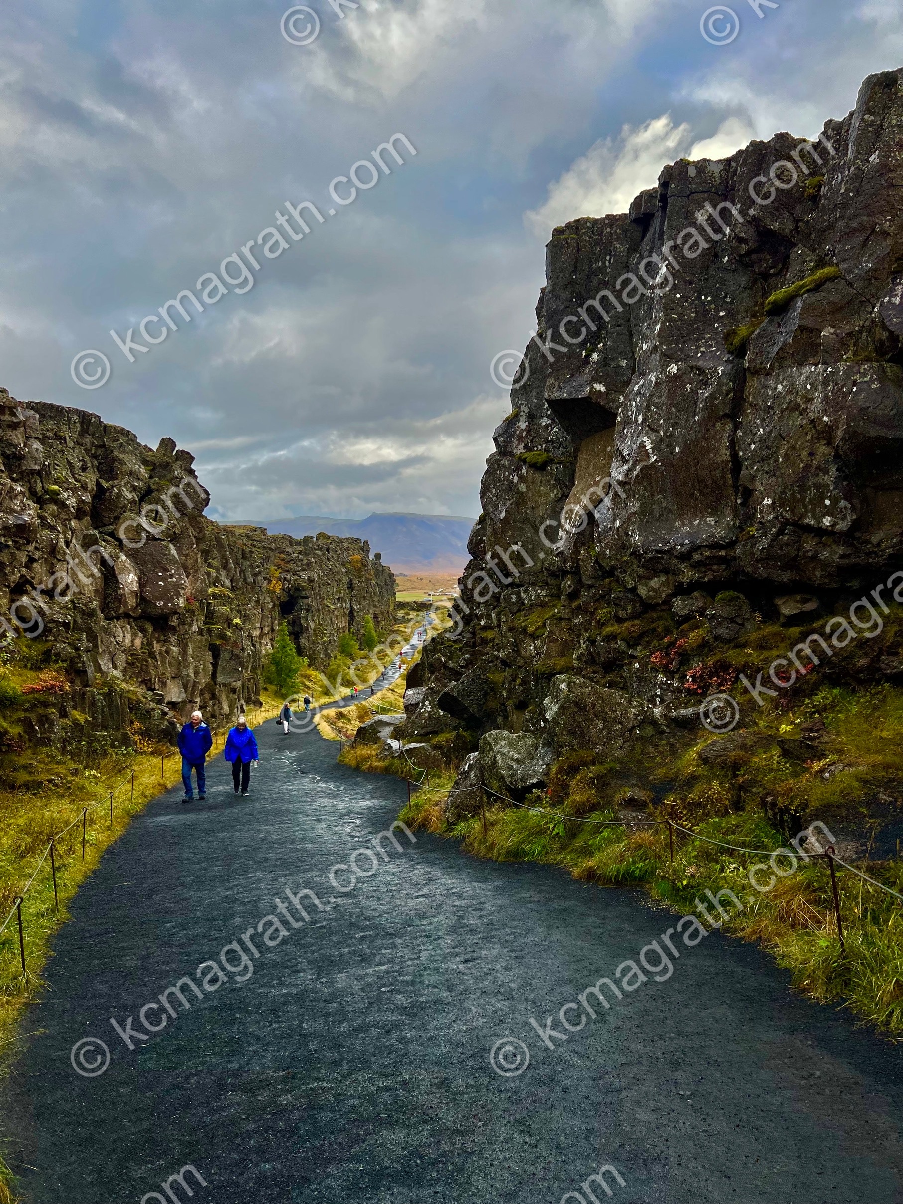 Selfoss' Thingvellir National Park & Couple with Blue Parkas, Iceland