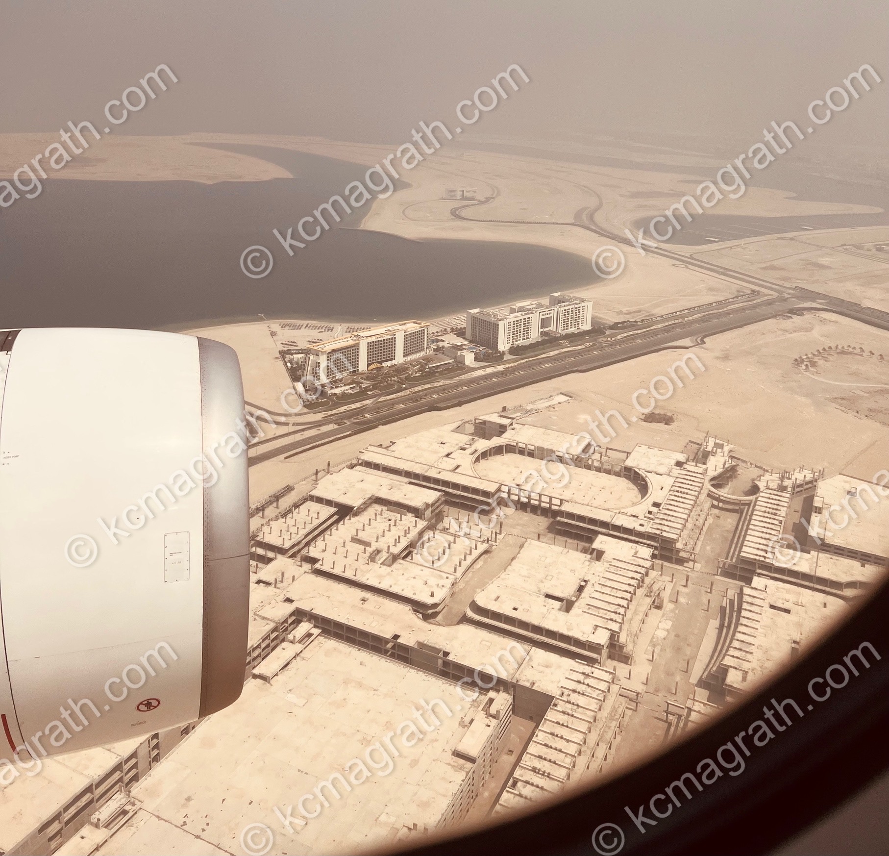 Dubai's Deira Islands, Aerial View Includes Plane Window and Engine, UAE