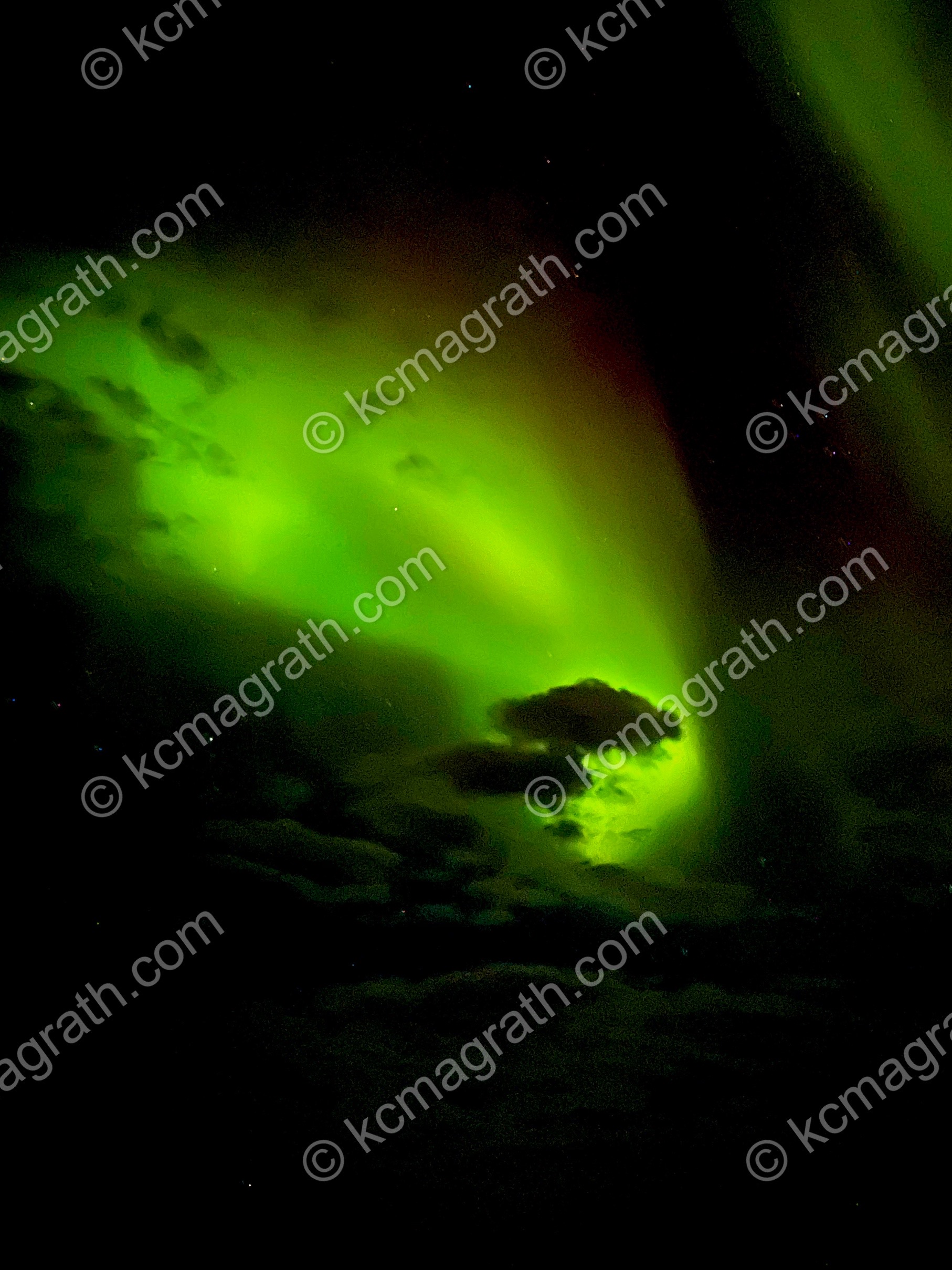 Vivid Green Northern Lights in the Icelandic Sea