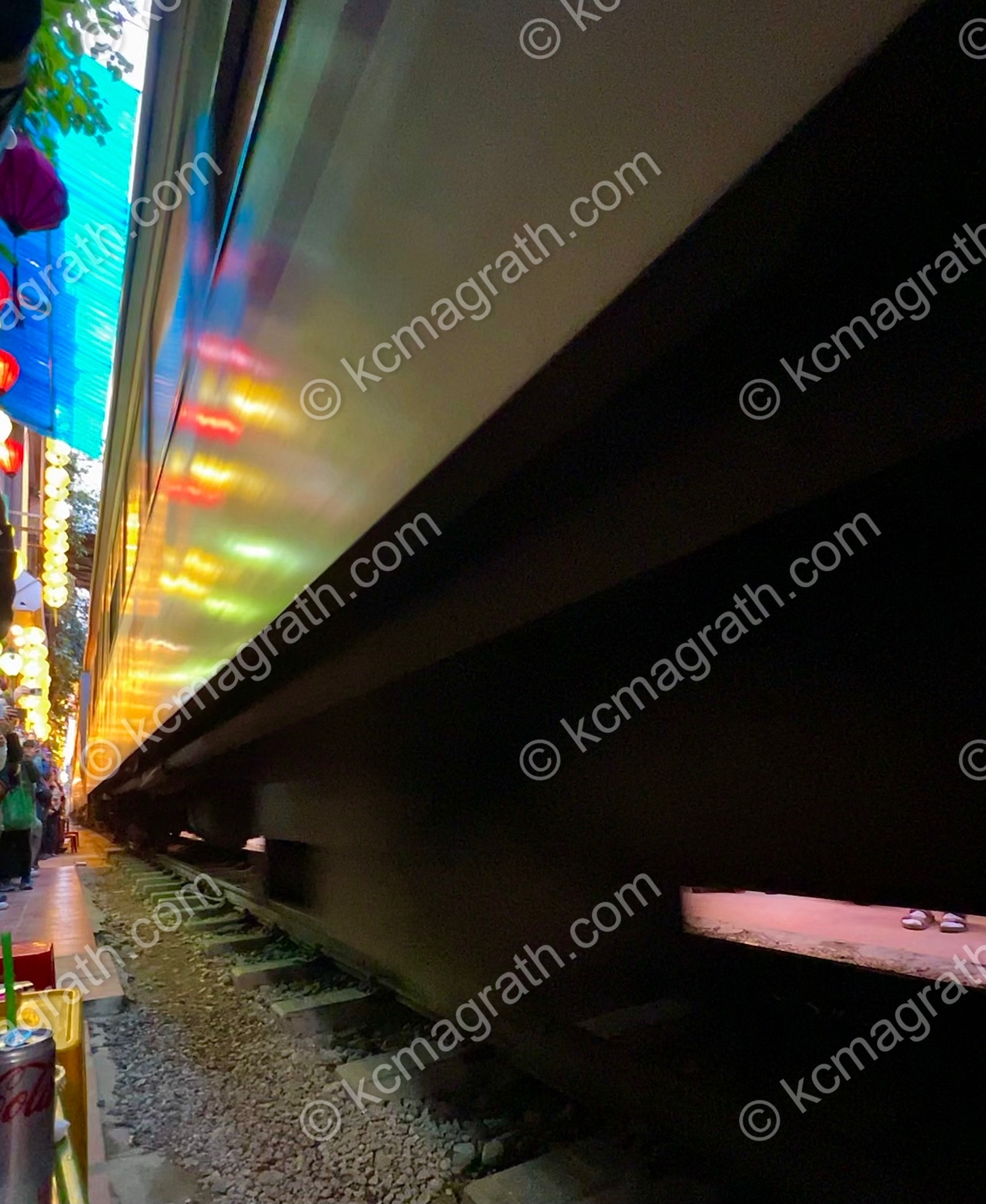 Hanoi's Iconic Colorful Train Street With Moving Train and Sandaled Feet, Vietnam