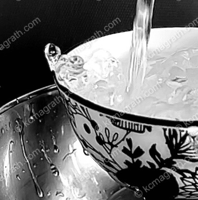 Water Pouring Into Teacup