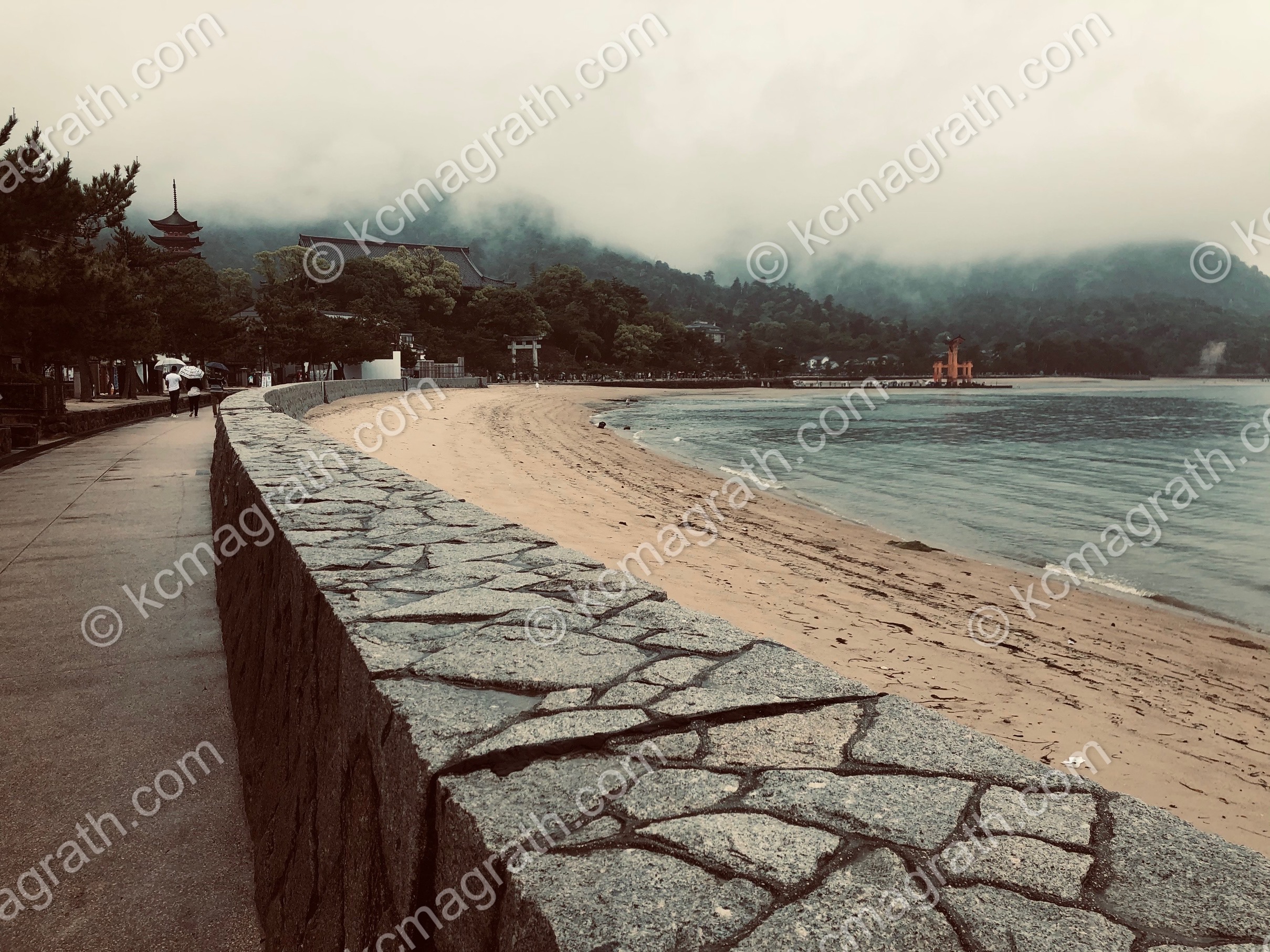 Miyajima Island's Wall Leading to the Great Torii Gate in Hiroshima Bay, Japan