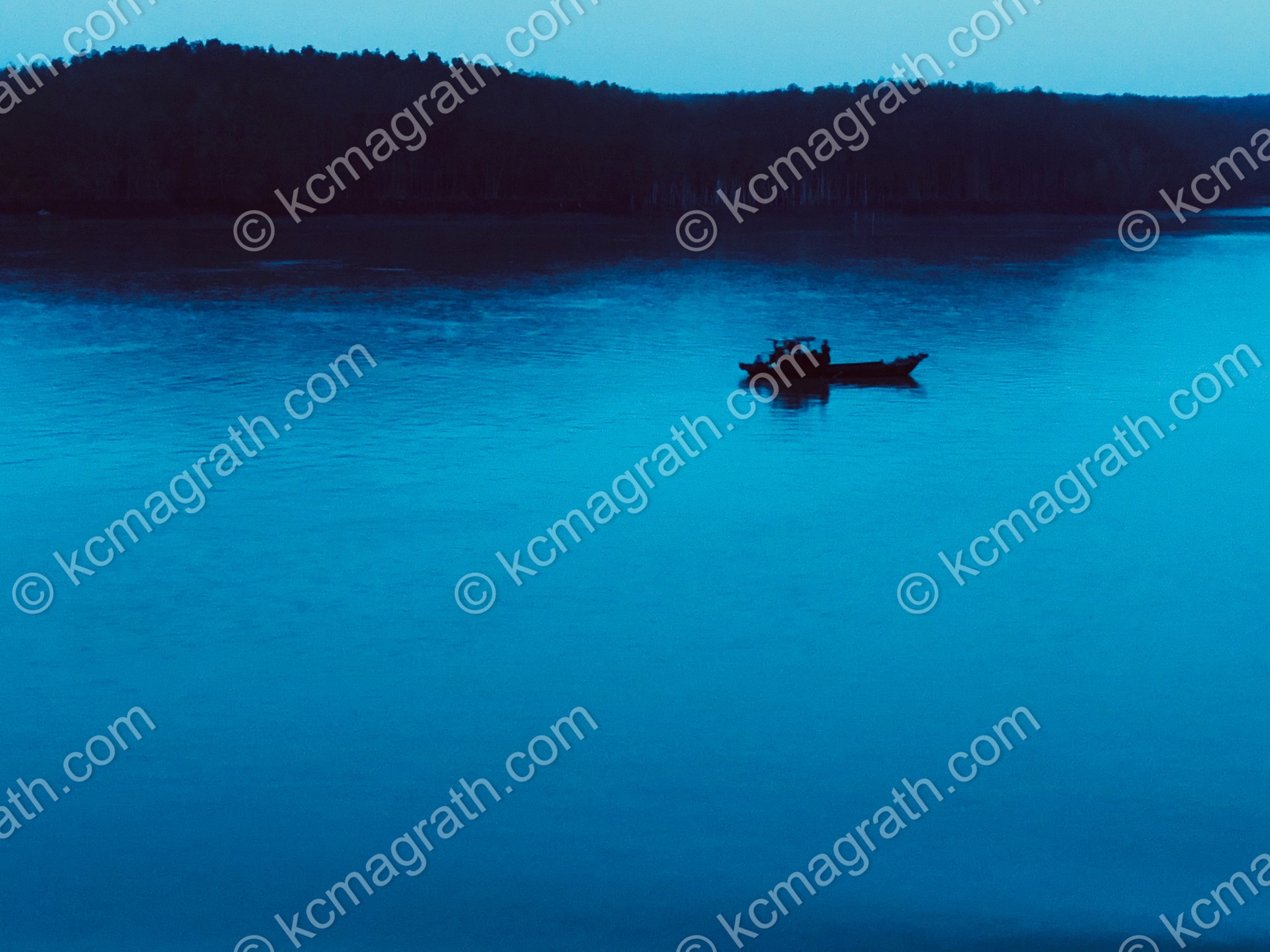 Nha Trang's Tri Nguyen Neighborhood with Silhouette of Traditional Ghe Nang Fishing Boat, Blue Hour, Vietnam