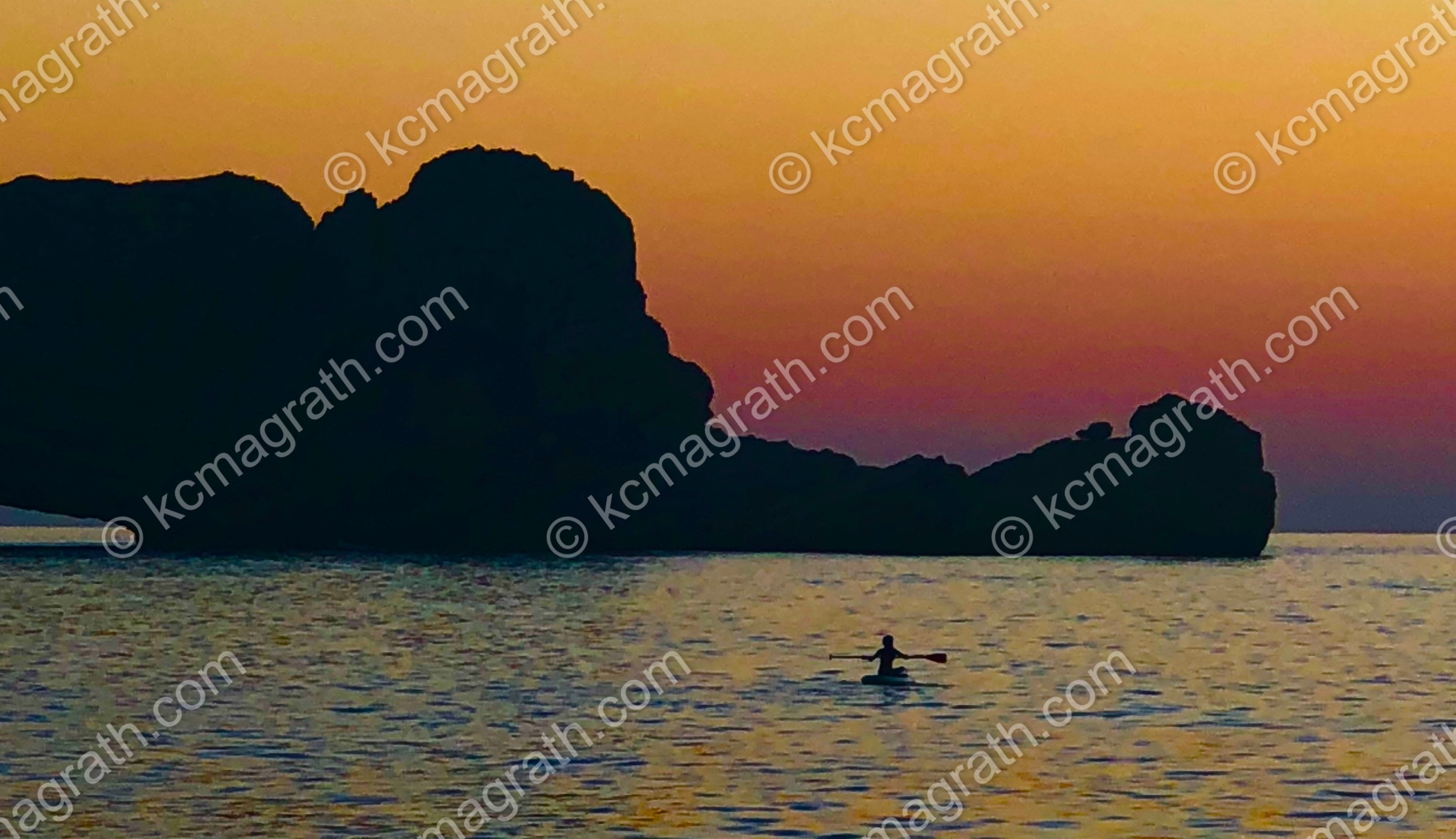 Ibiza's Sant Antoni de Portmany Silhouette with Kayaker, Spain